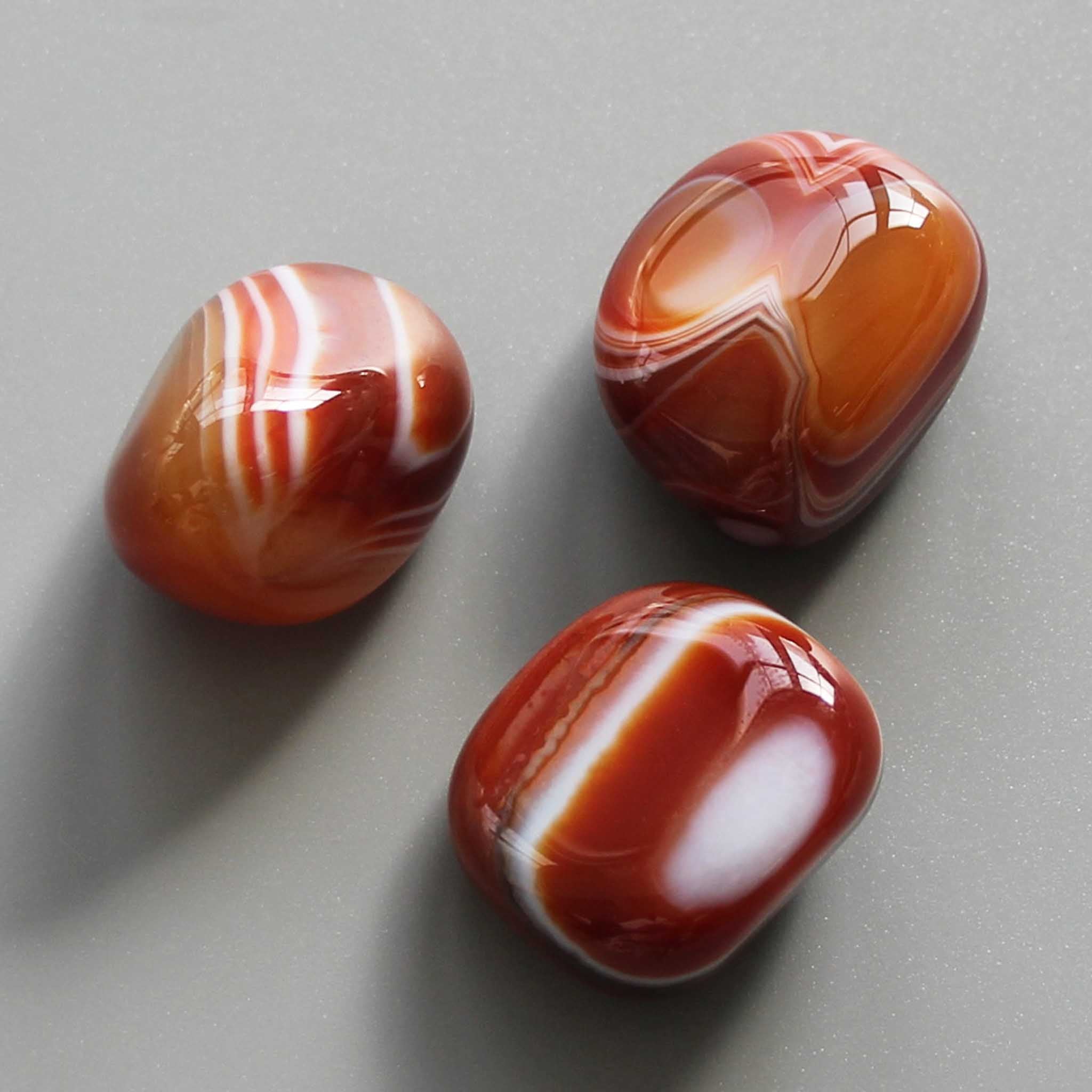0a0afbc38393e88dd3e6bdbfee21dc9a-1 Carnelian With Stripe Tumble Stone 1 inch (2-3cm) A+/AA