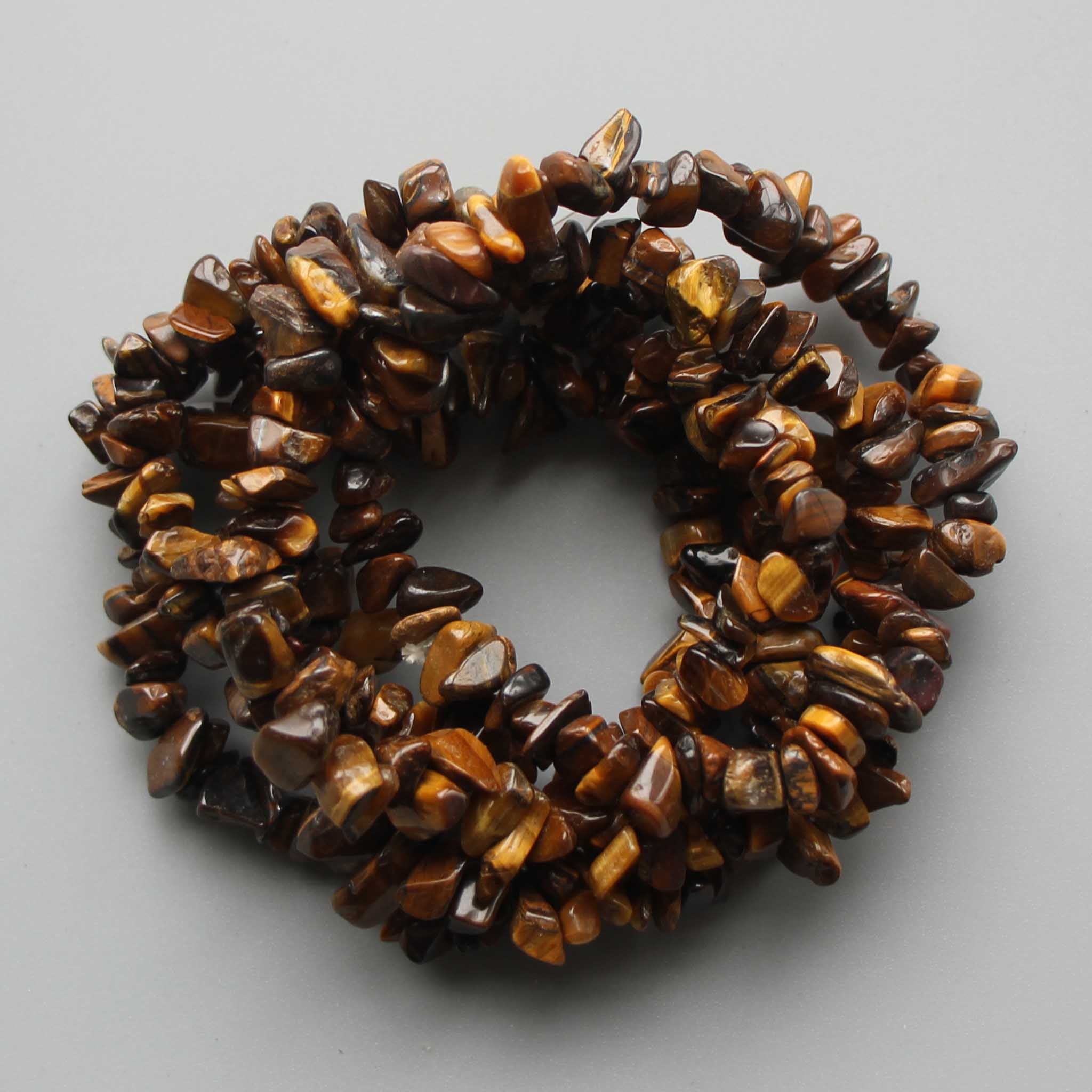 12e083ce851f8611fe80742c1bebf3b9-1 Golden Tiger Eye Chips Bracelet 4/8mm A/B