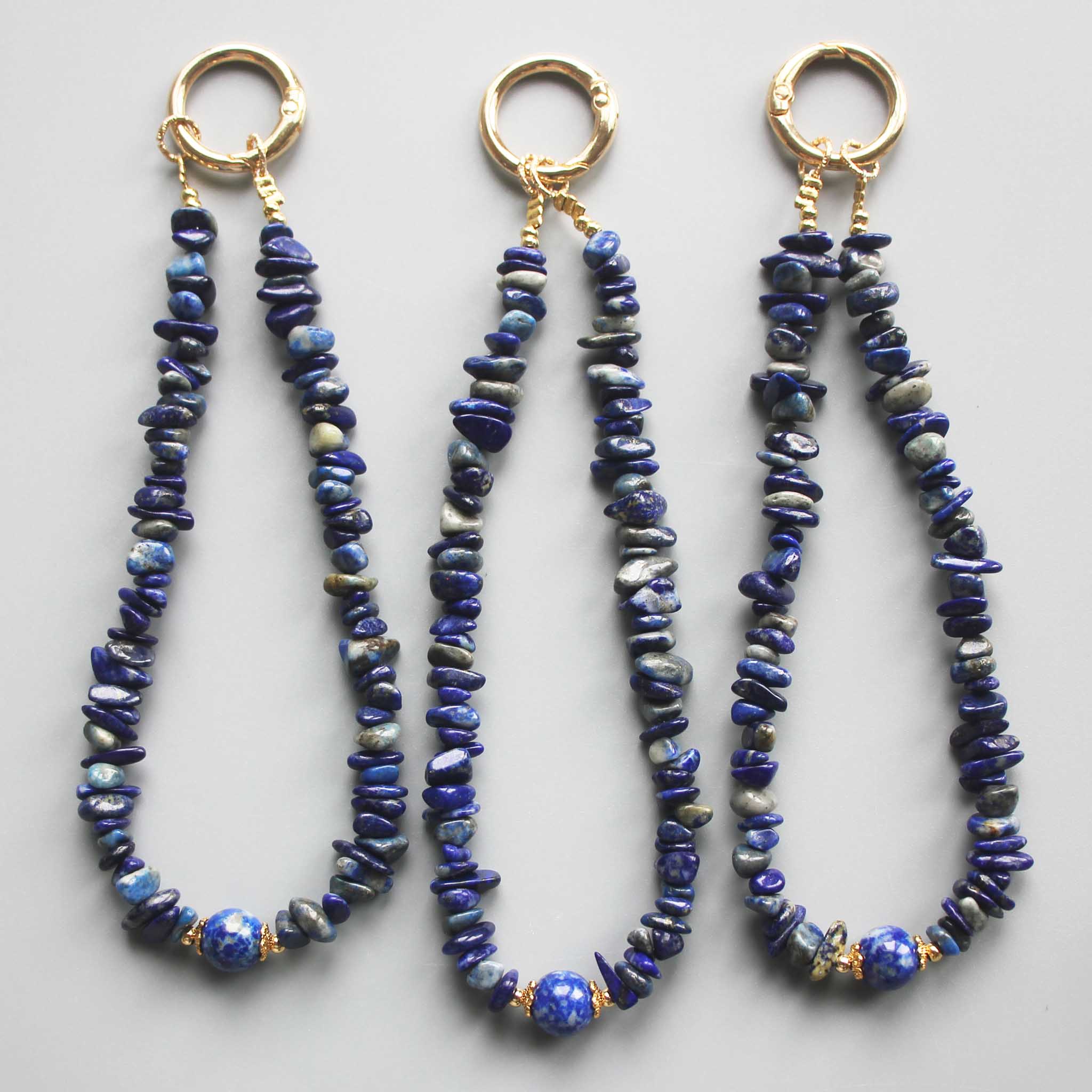 1683f981efb0d07bdb69a5e234c760cc_82fe0879-3f7e-4c19-aa5e-d4a500a18583 Lapis Lazuli Chips Phone Cord 5/10mm A