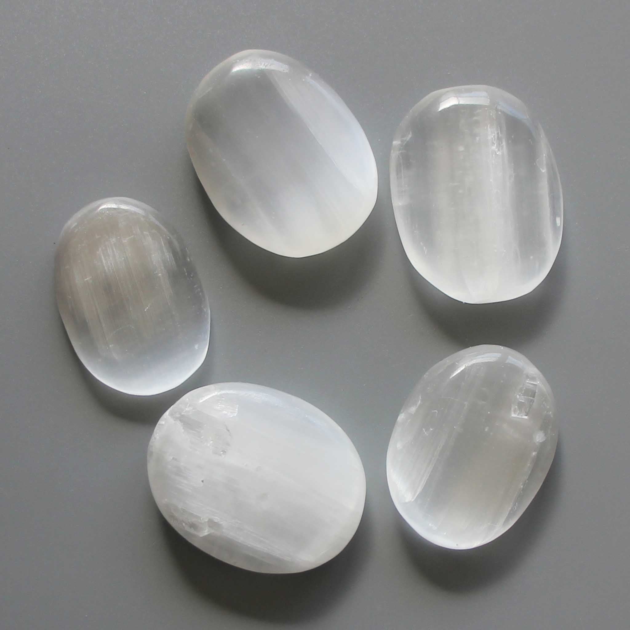 1cfd287add9e10924474fd462860db2b-1 Selenite Satin Spar Smooth Stone 1.6 inch (0.8-1 x 3.5-4.5cm) A