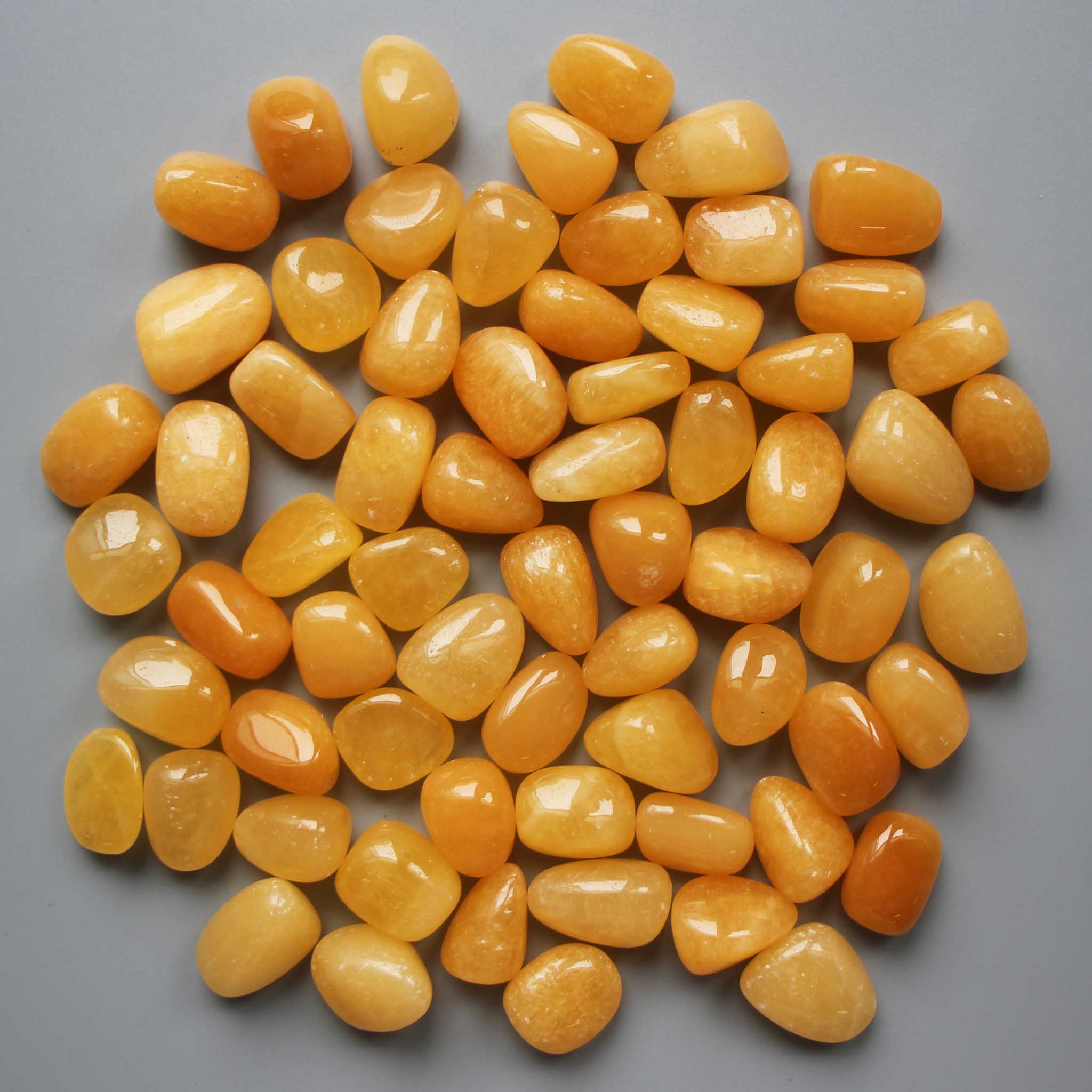 2255a76d5fd121dfdfaf32dfaf0e68a1 Orange Calcite China Tumble Stone 20/30mm A