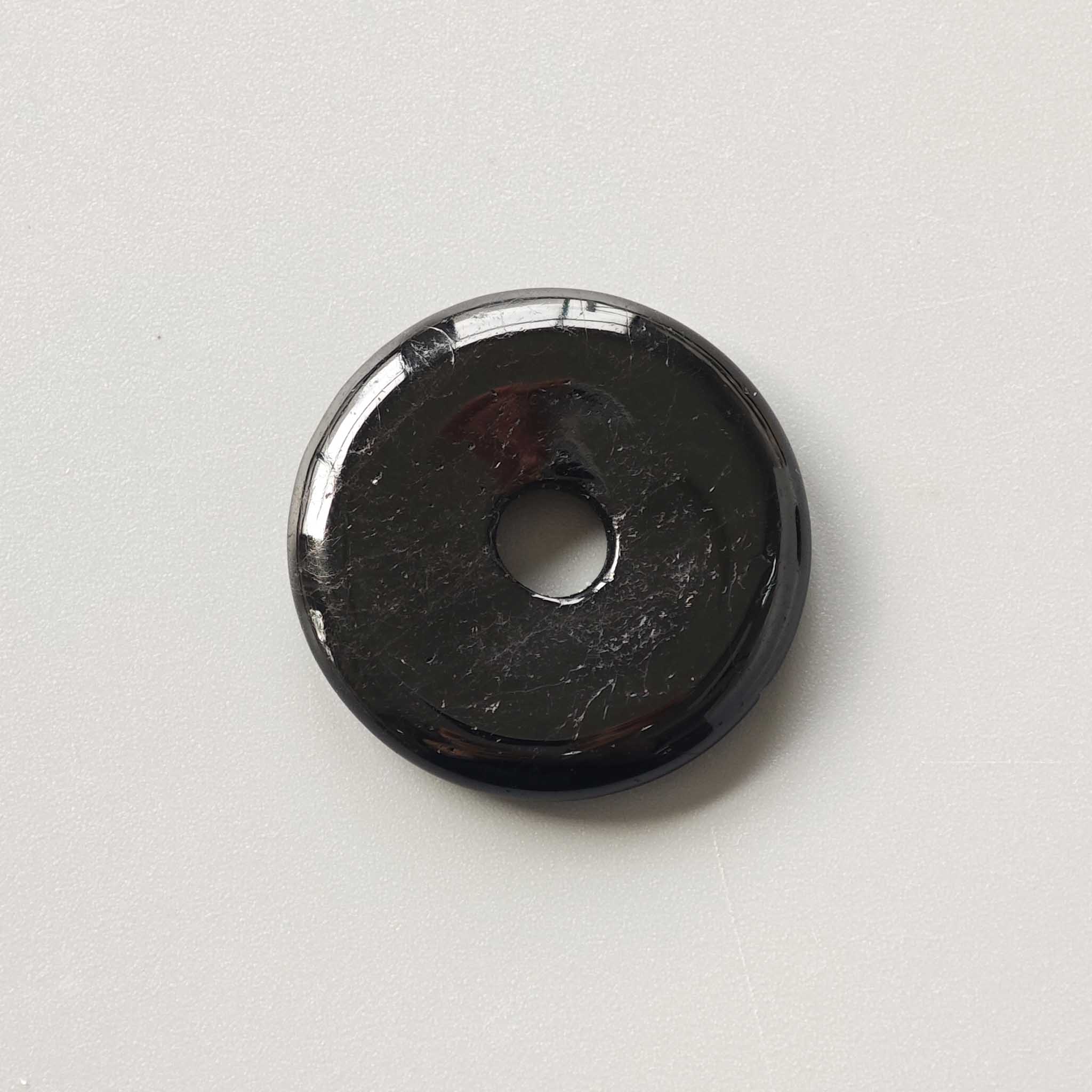27523ed91a760a4570d1525c8edcdc76-1 Black Tourmaline Donut 1.2 inch (0.6 x 3cm) A