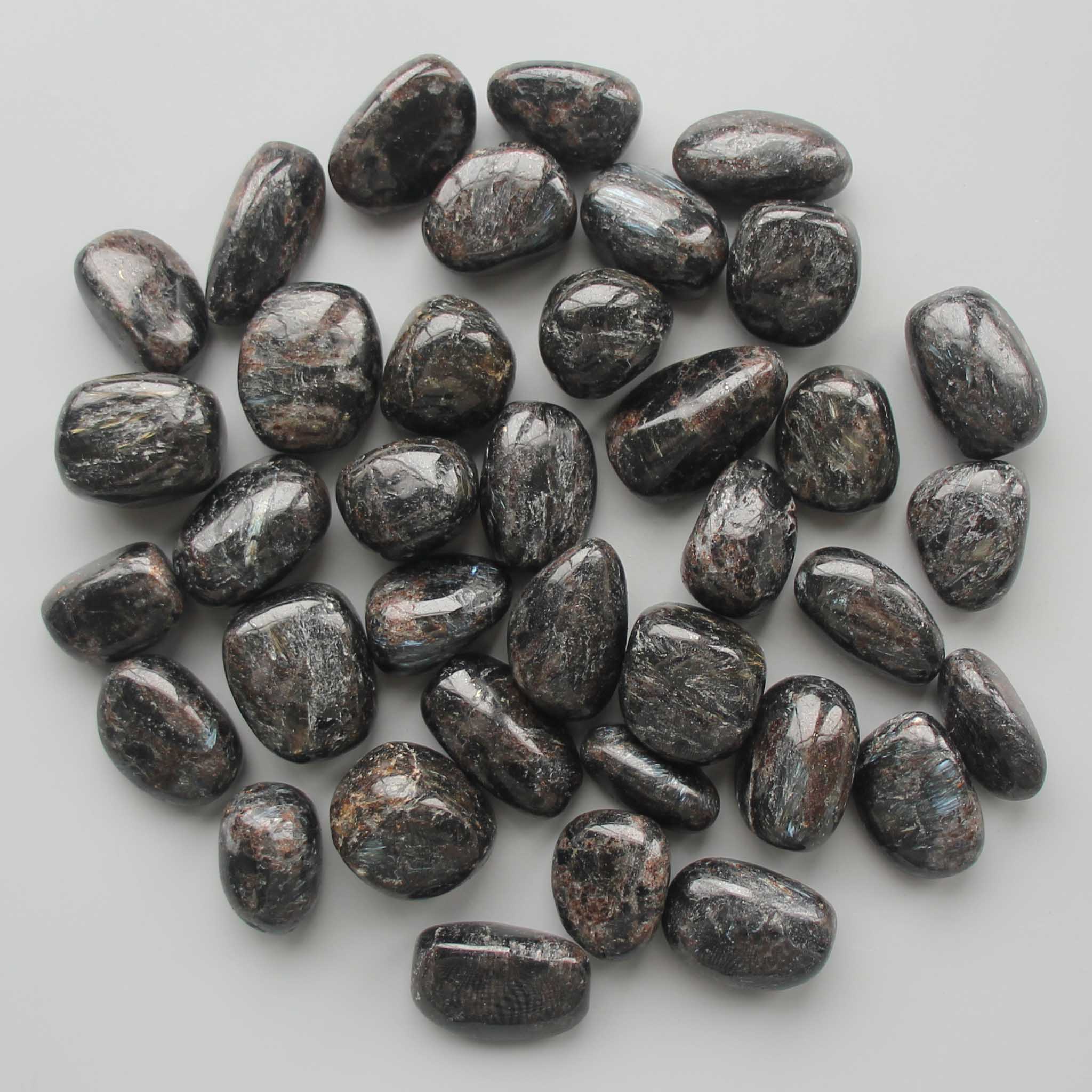 2a678ebf68662a2712bebe2a466acbd0_0d682c56-1b0b-4918-be1b-6b998b2b80d1 Arfvedsonite Tumble Stone 1 inch (2-3cm) A/B