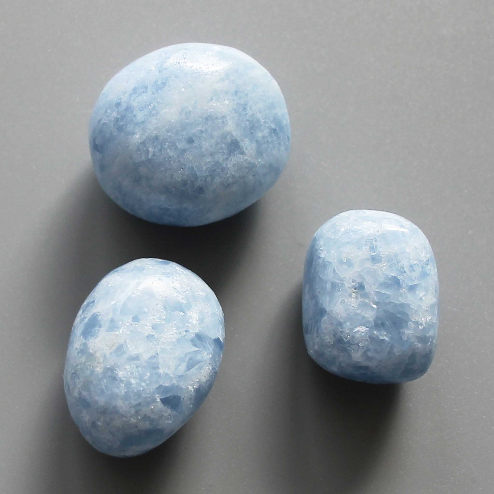 2f9b2d3aa0649dad927ccb045b0b8f9d-1 Blue Calcite Tumble Stone 1 inch (2-3cm) A