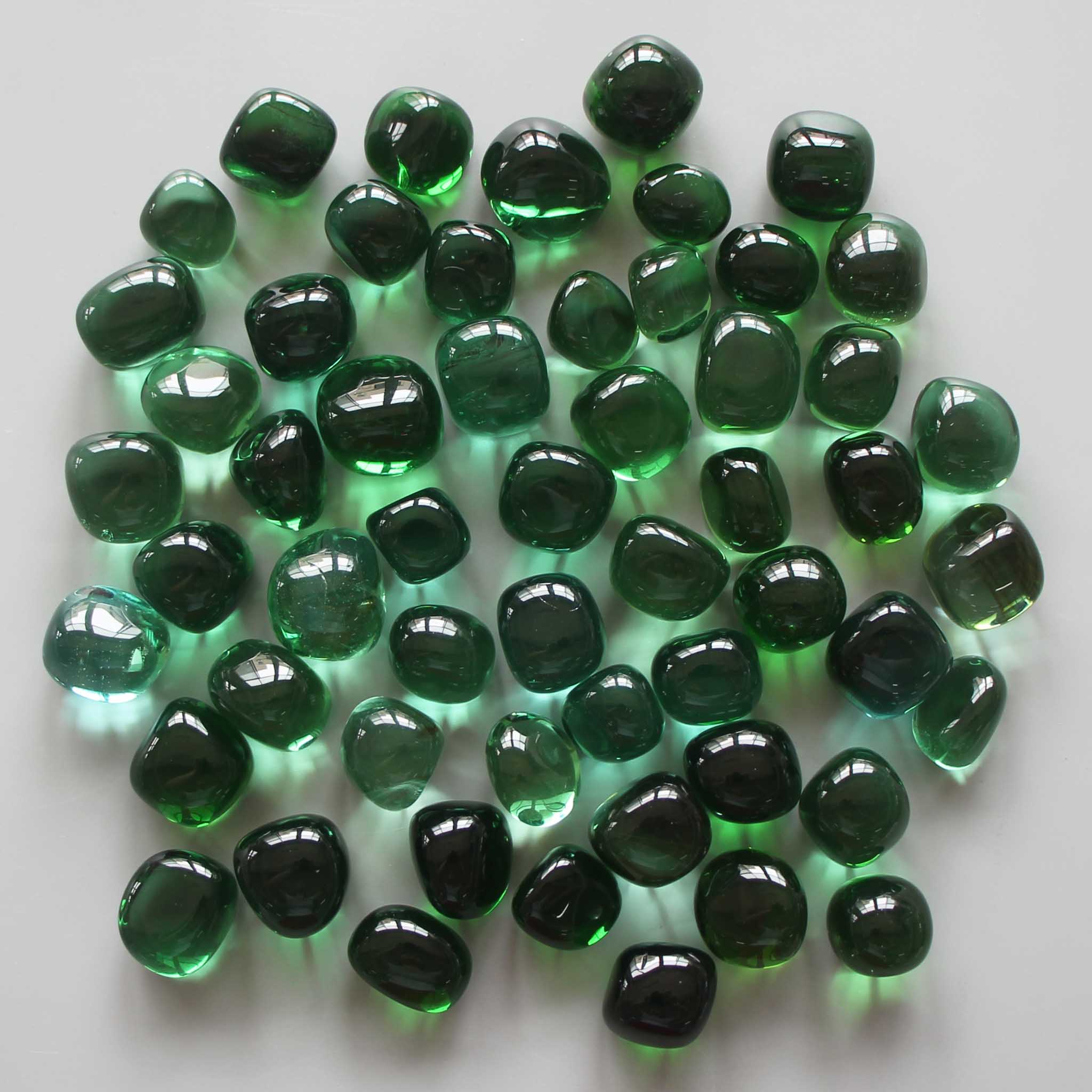 30177b540f1b02968bebe81e3609519c_9e1693fe-7ad3-4856-a0a1-1fcedf9a8e3a Green Obsidian Man Made Tumble Stone 20/30mm A