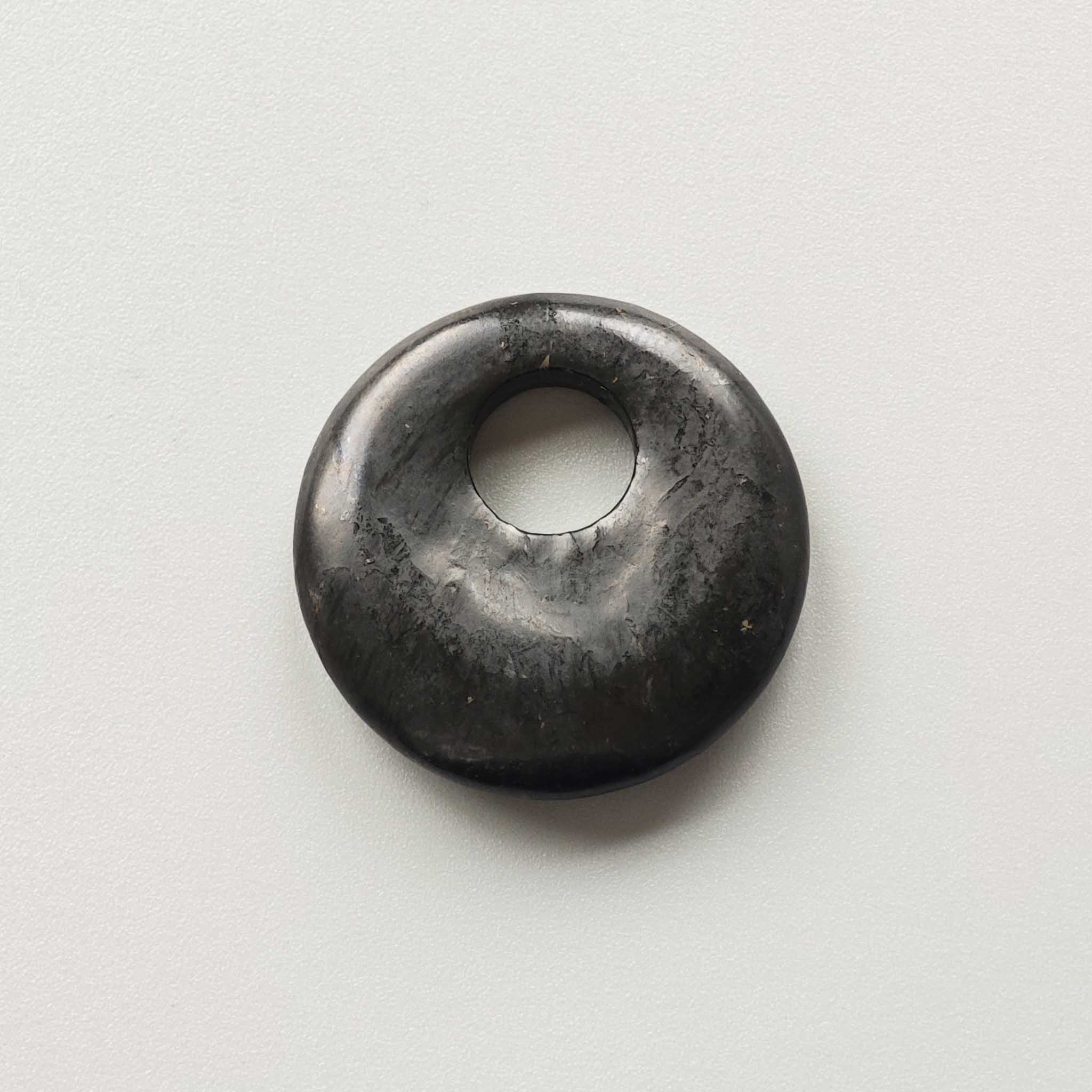 3584f9d124c0fffbdd22e621fff4250f-1 Shungite Round A go go 1.3 inch (0.7 x 3.3cm) A