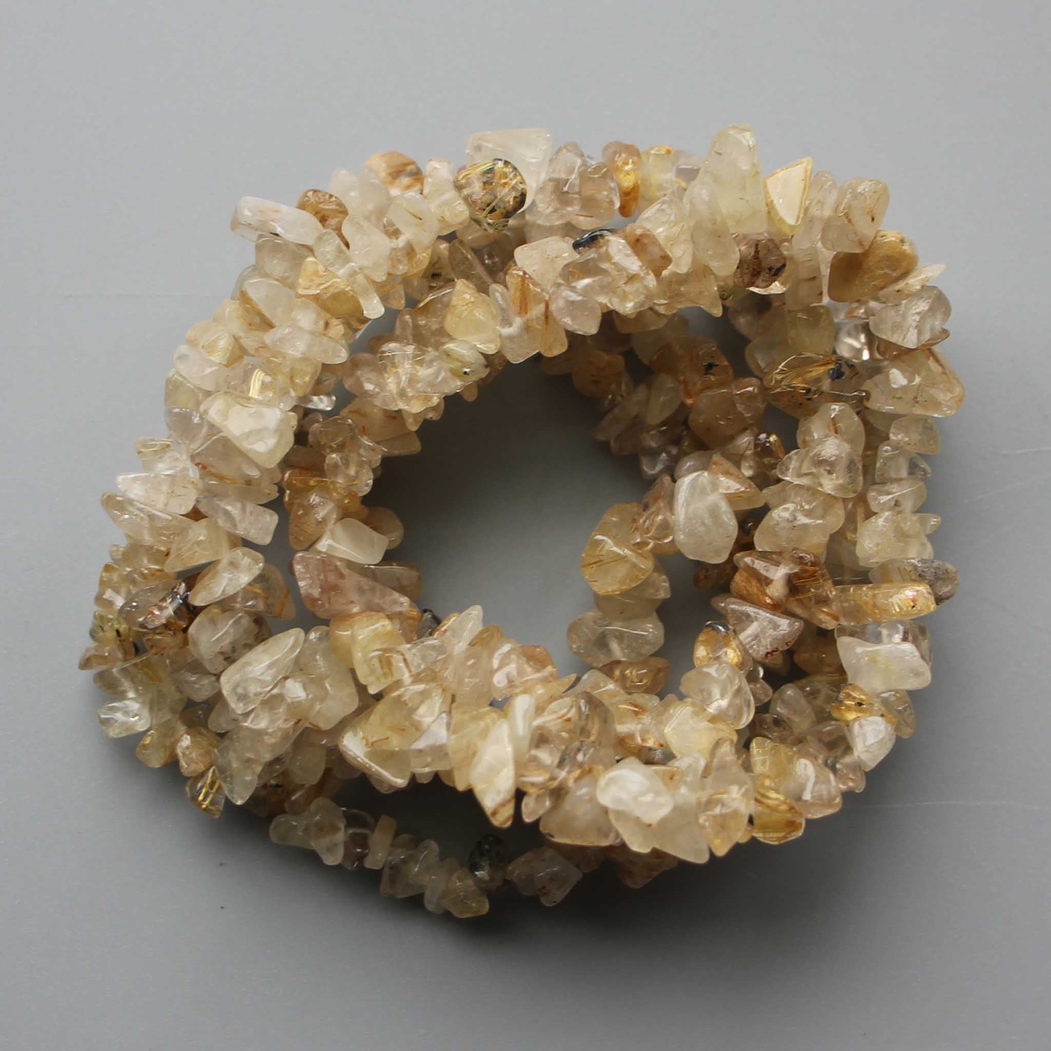 4e9e6cec4d01bd6a712b36c529daa0a1-1 Gold Rutile Quartz Chips Bracelet 4/8mm A/A+