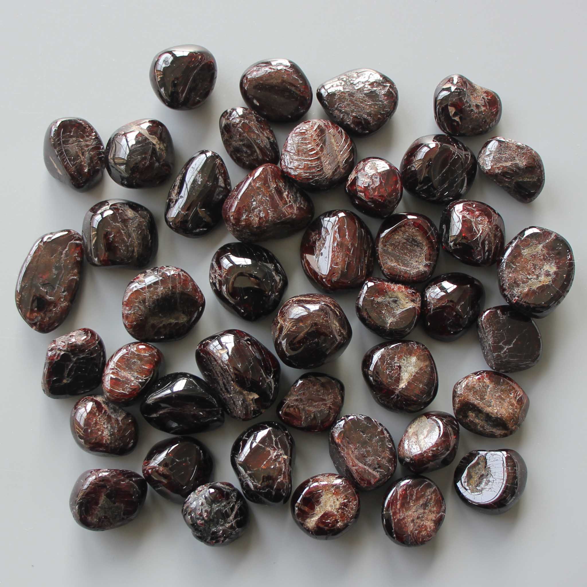 528e5770454d100e4290dcff11e19b13-1 Garnet Tumble Stone 1 inch (2-3cm) A/B