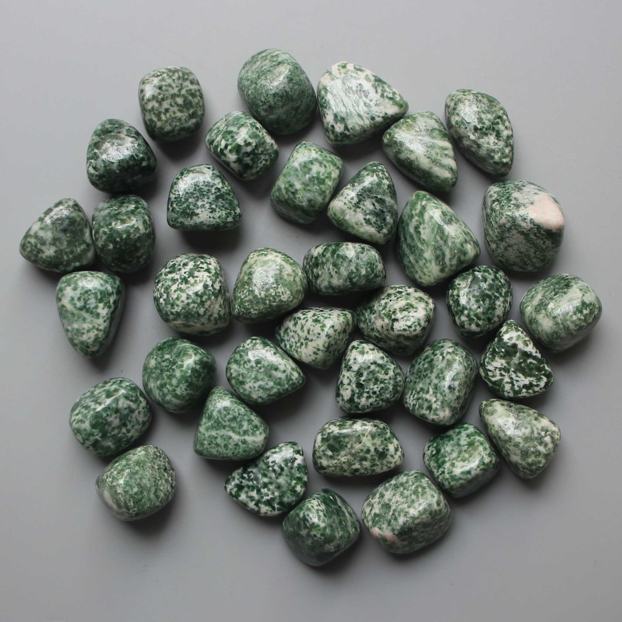 5b3157b26652480e7a3fc213aaa362b4_2f7ec2fb-7eaa-49cf-a371-a447b501860e China Jade Green Spot Tumble Stone 1 inch (2-3cm) A