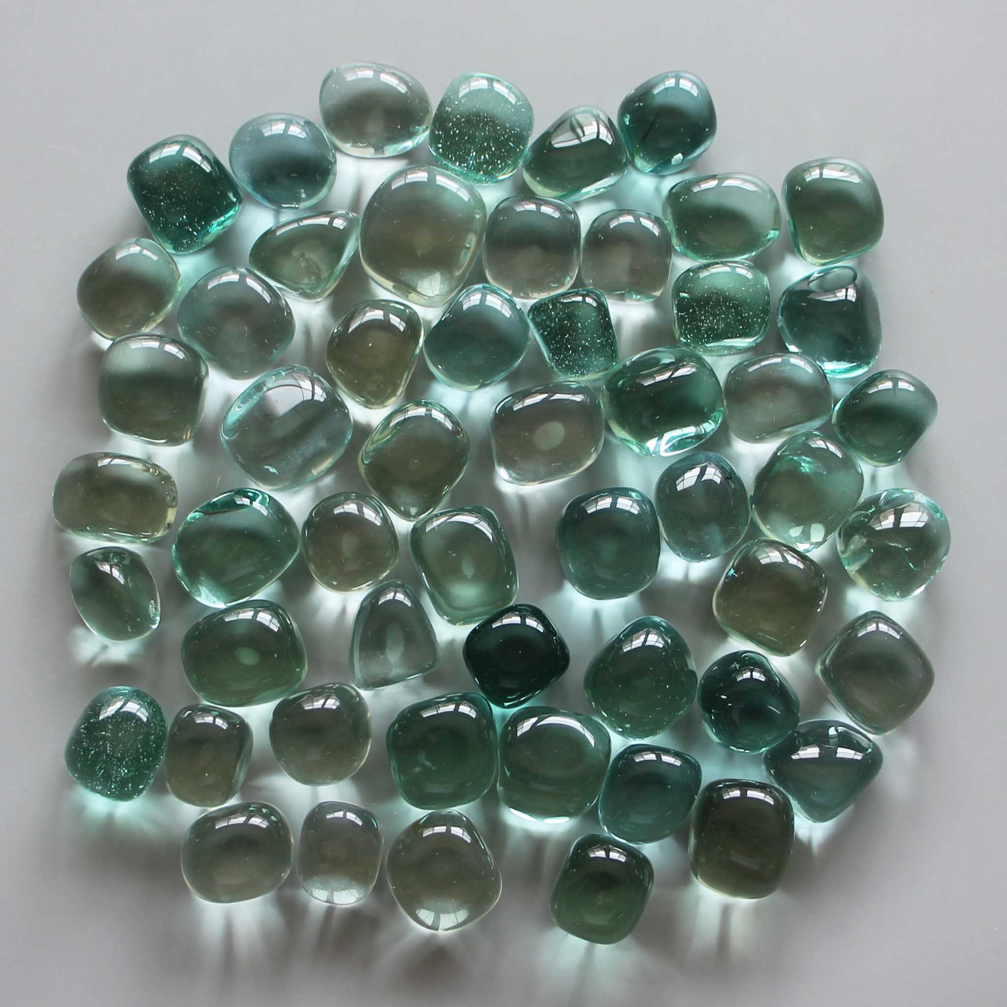 61f8266bfbf324a1cf0ea26ce6aa7964_1d078ff1-e20b-4cc0-a2e9-f54bb3fb7cfc Blue Obsidian Man Made Tumble Stone 20/30mm A