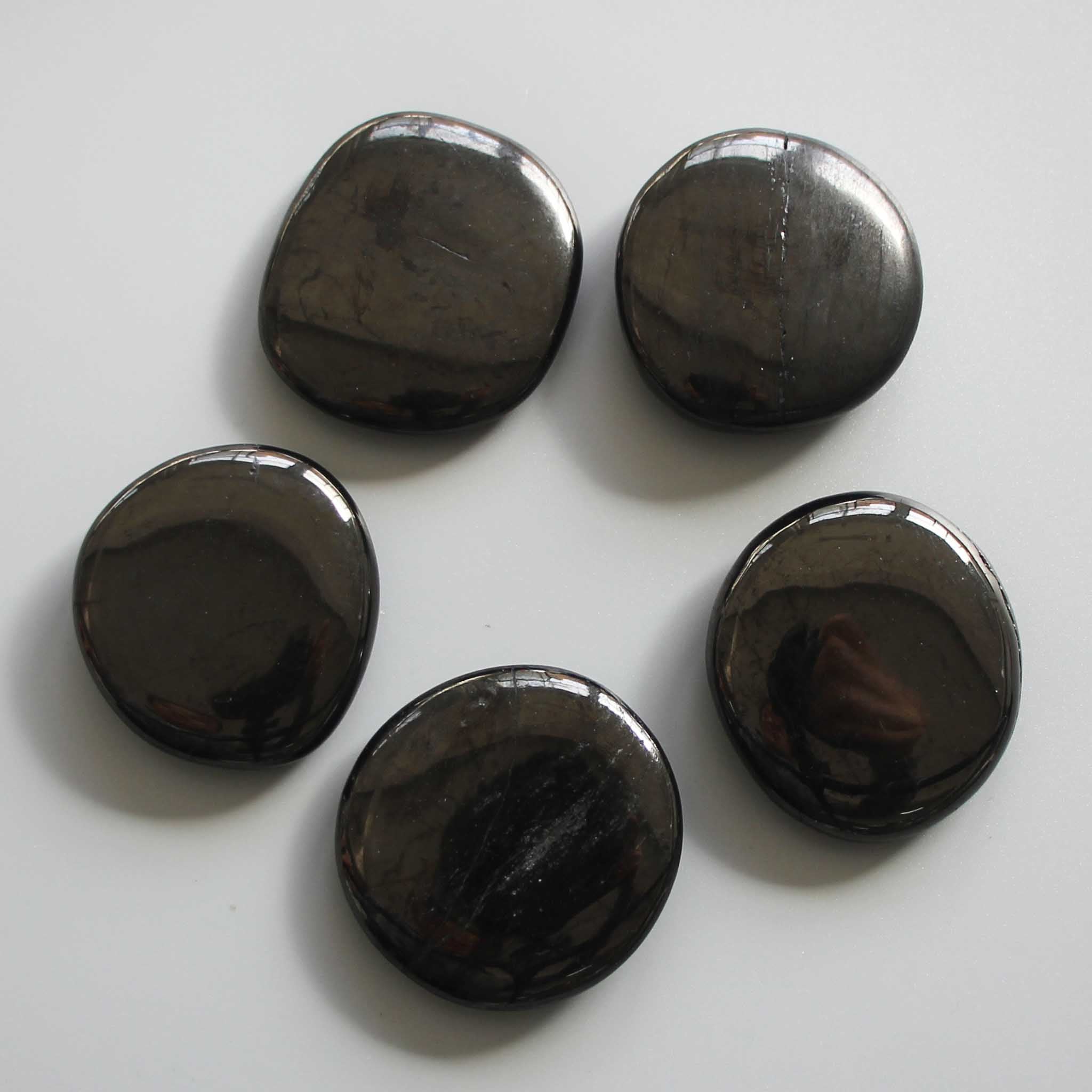 7b0f1da914cd1d375776a2bacf11a6b0-1 Jet Smooth Stone 1.6 inch (0.8-1 x 3.5-4.5cm) A