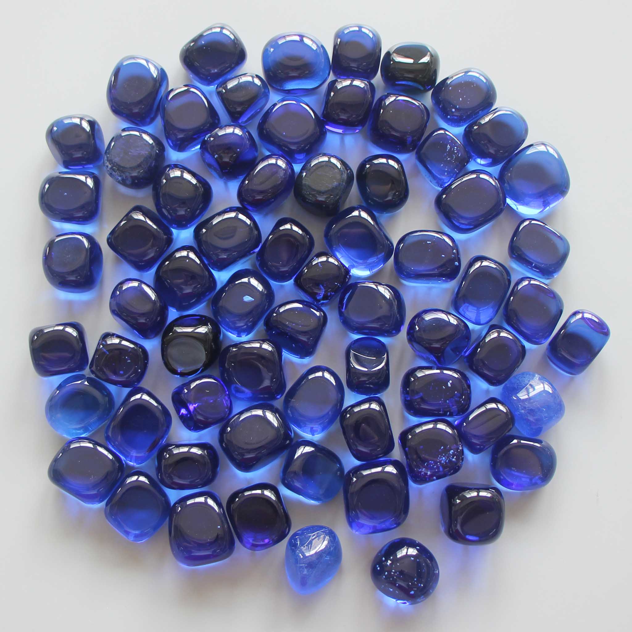 8426d9d6dd14cc266a1fd98a8233a7d1_9eee4c4e-06d6-438a-bf0e-e55985d83236 Dark Blue Obsidian Man Made Tumble Stone 20/30mm A