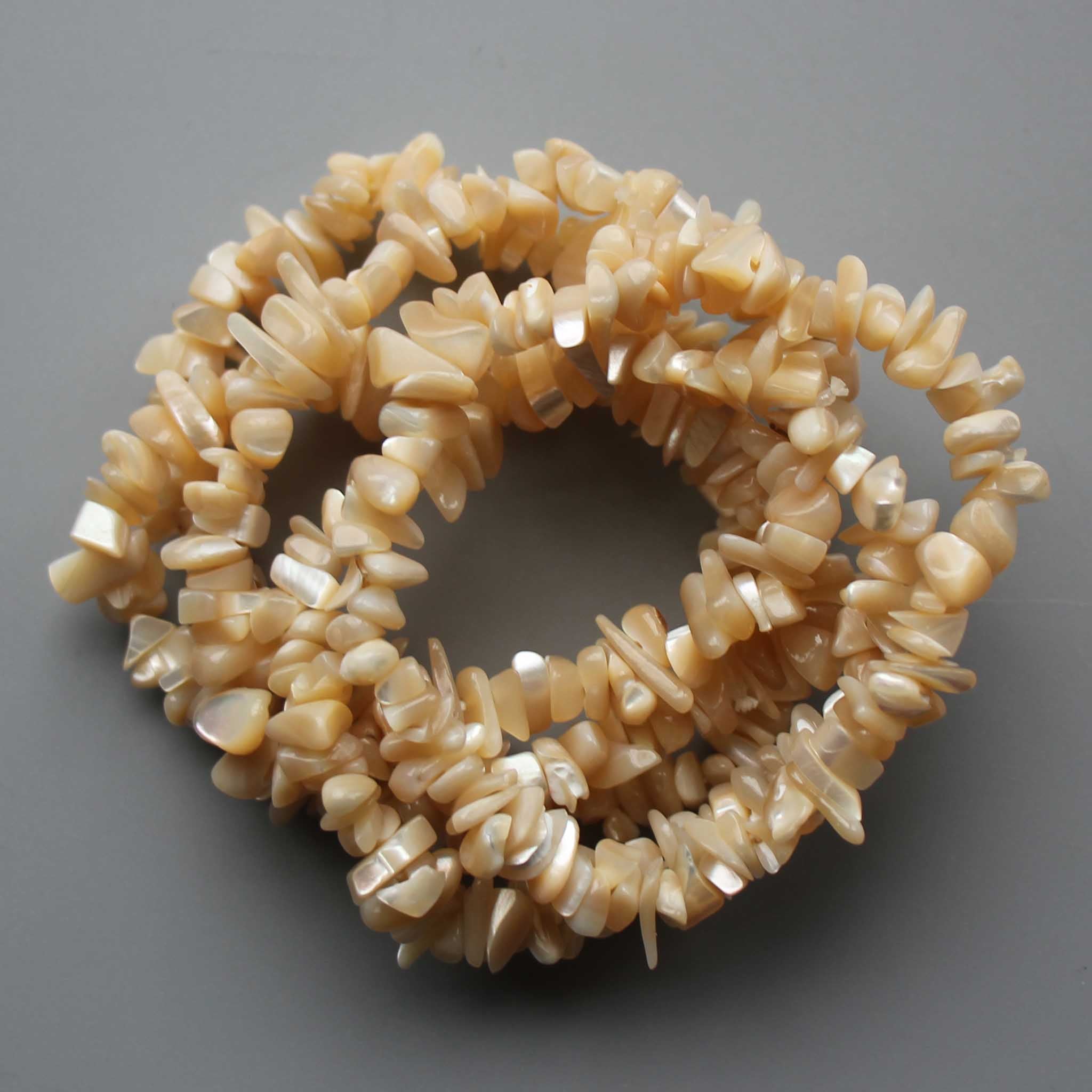 a1917471e310a5bb99cd357d1e588d88_d3f2fb94-d349-494d-92cf-02d262ca96b3 Brown MOP Chips Bracelet 5/10mm A