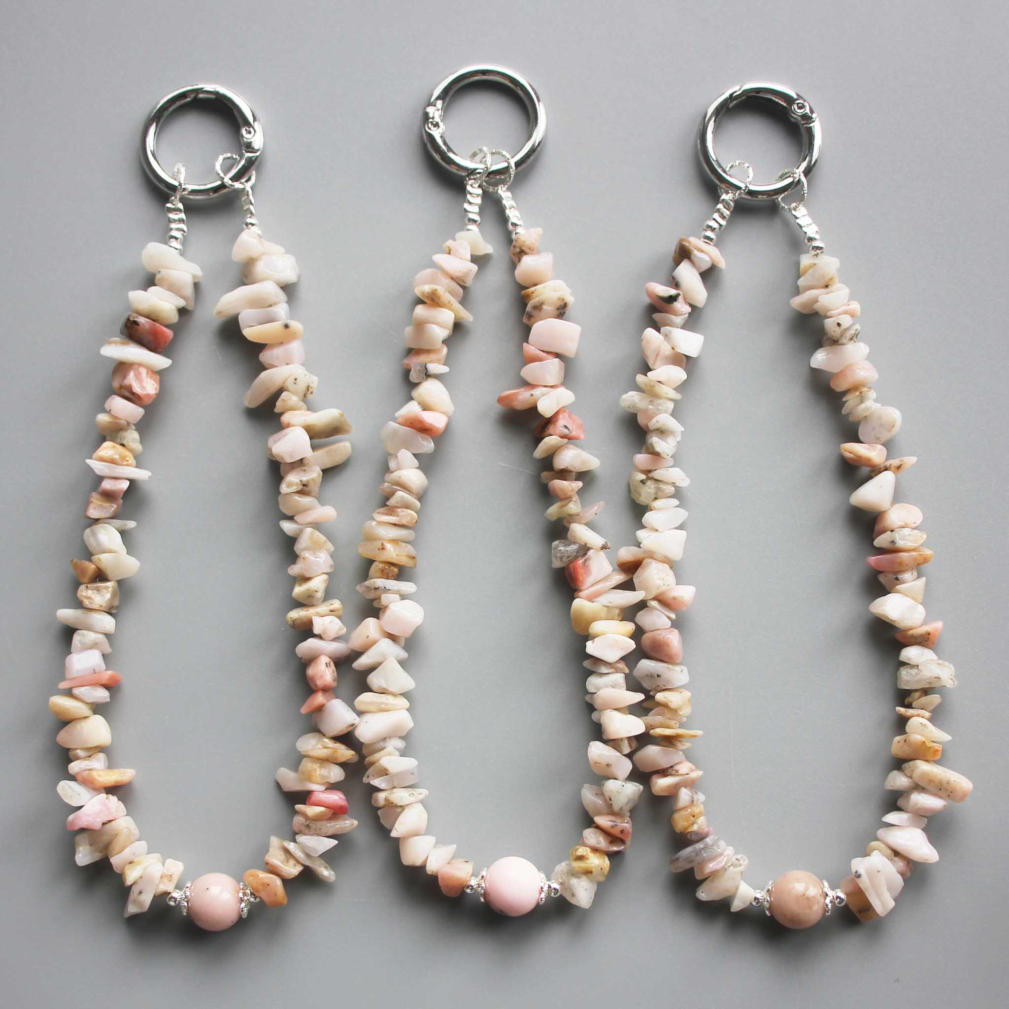 a27716ce885185eae9fb8061911848df_a9669459-c298-404f-bb75-0f58c705984c Pink Opal Peru Chips Phone Cord 5/10mm A/B