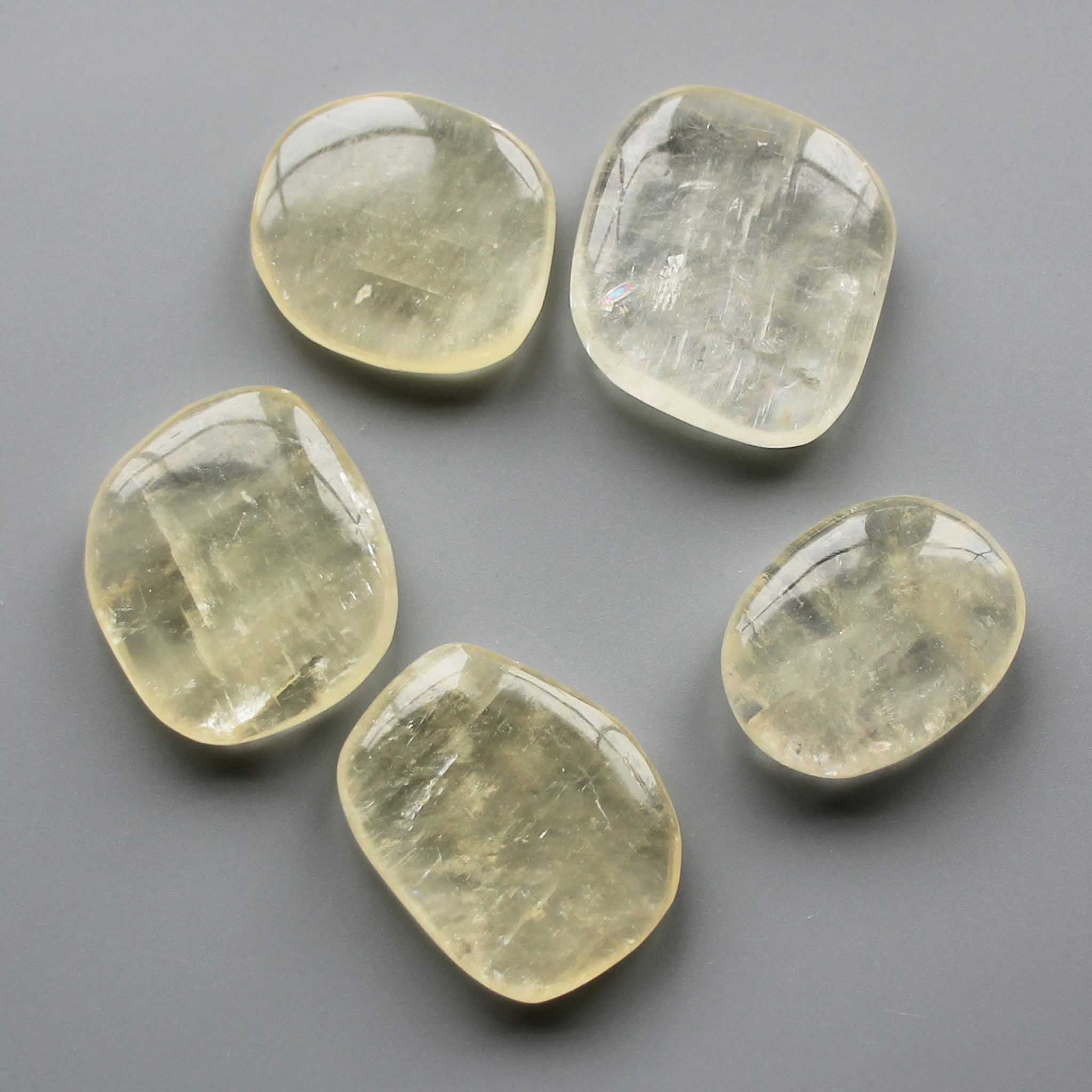 a58fbc781d4579e401422617845baa35-1 Yellow Calcite Smooth Stone 1.6 inch (0.8-1 x 3.5-4.5cm) A