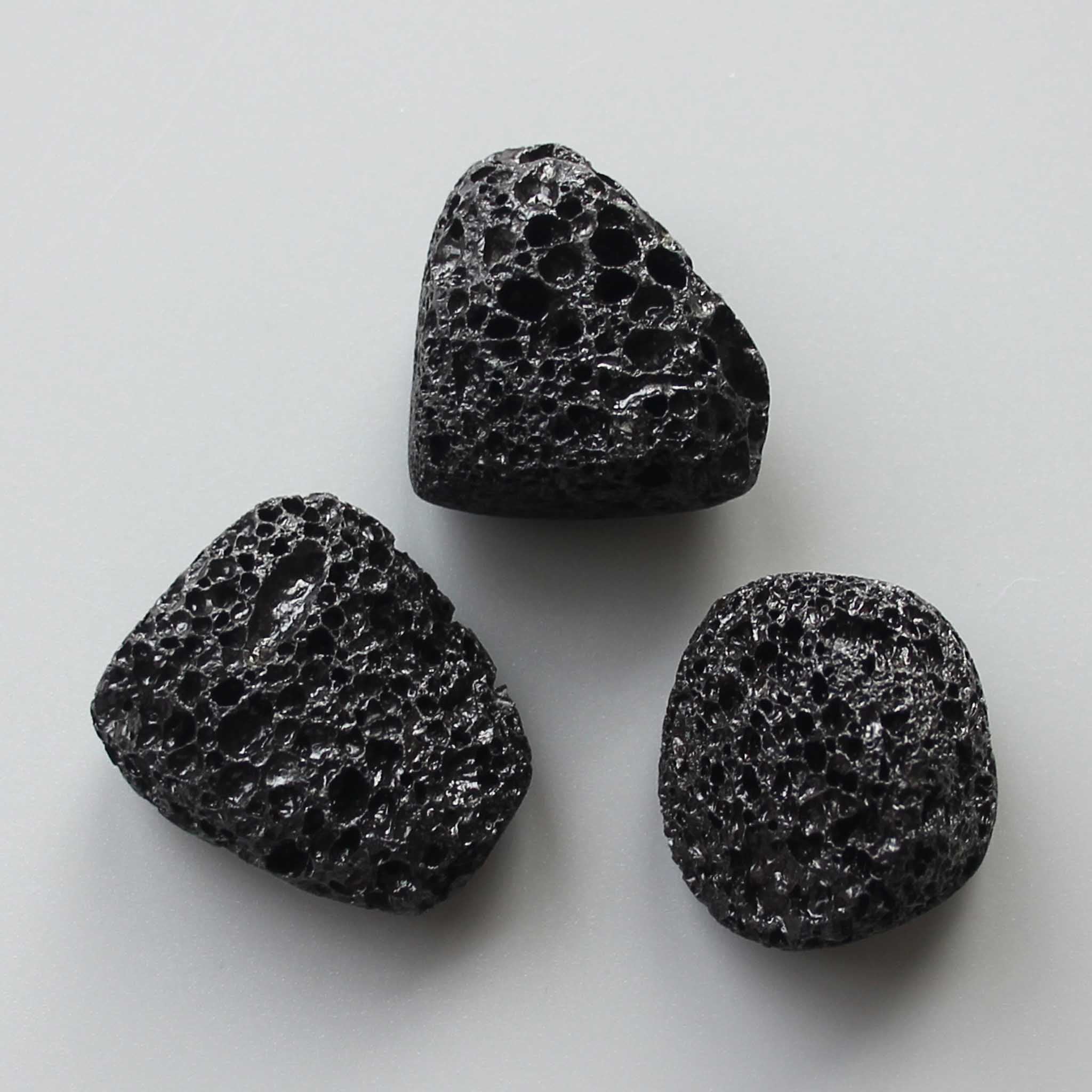 aaaedcc9e7a5cd96b2ec17b9d878774e-1 Lava Black Tumble Stone 1 inch (2-3cm) A