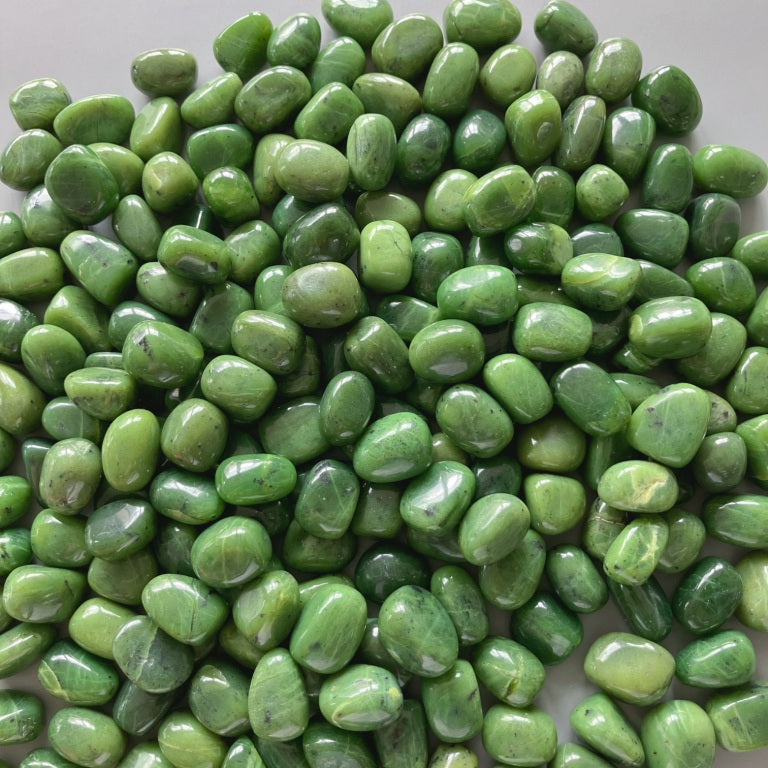 bc092b72595e5f9ecf61f048068e6cd2_068f755f-cdb8-4cb2-b27a-24acb3533122 Soft Nephrite Jade Tumble Stone 1 inch (2-3cm) A