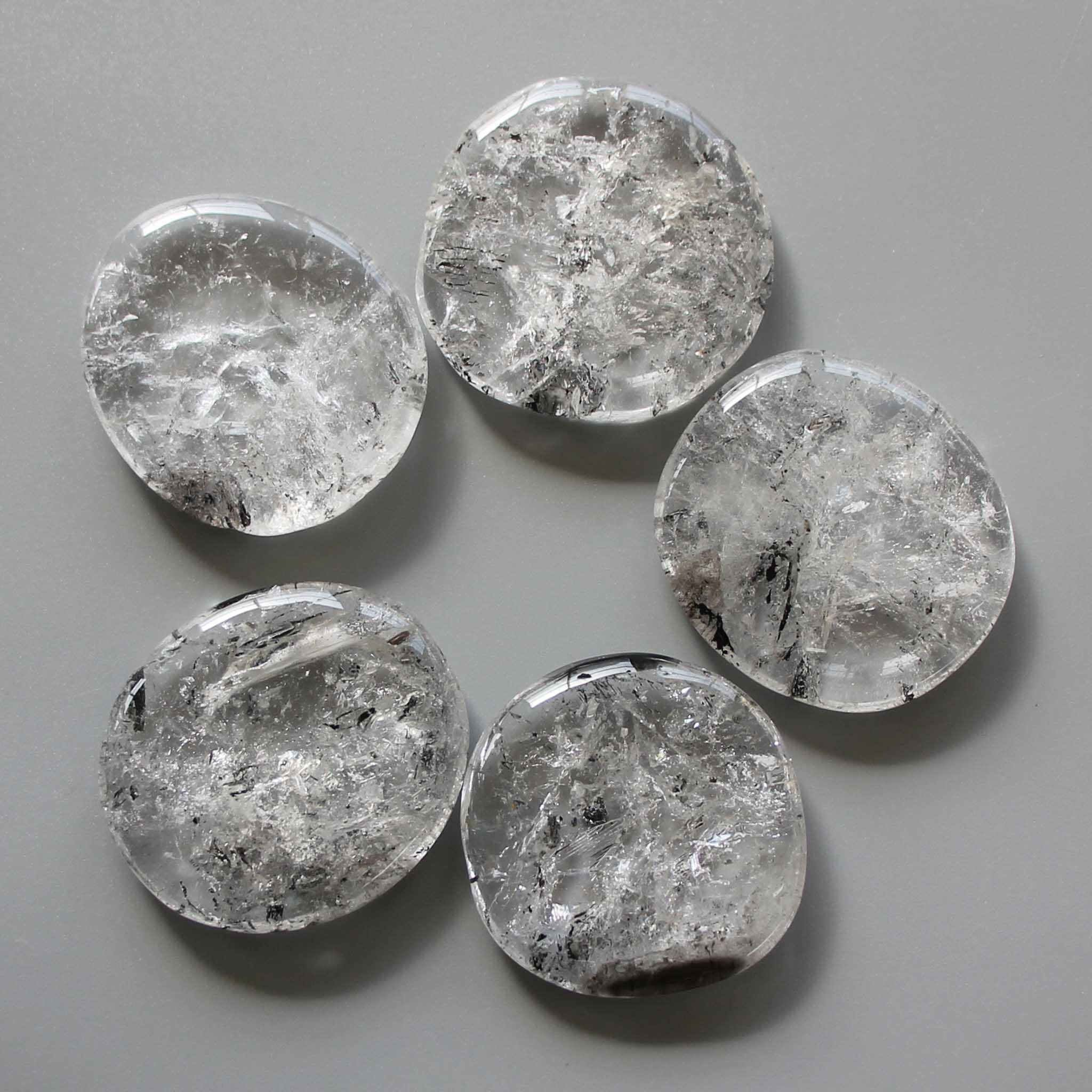 be19ef0a9b1a31dd2214db0d7374124e-1 Crystal With Black Inclusions Smooth Stone 1.6 inch (0.8-1 x 3.5-4.5cm) A