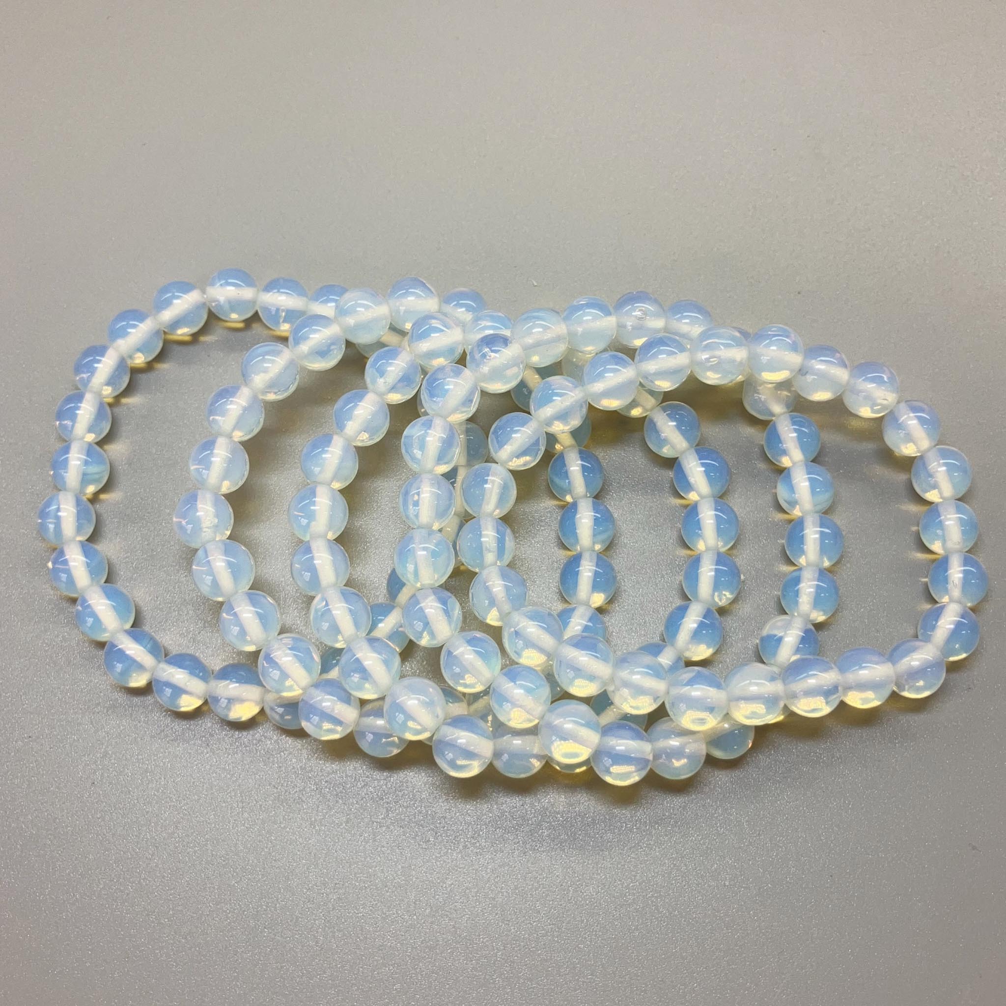 c350d63b2f6762f8fcbf278813cc3ba0-1 Opalite Round Bracelet 18cm 8mm A