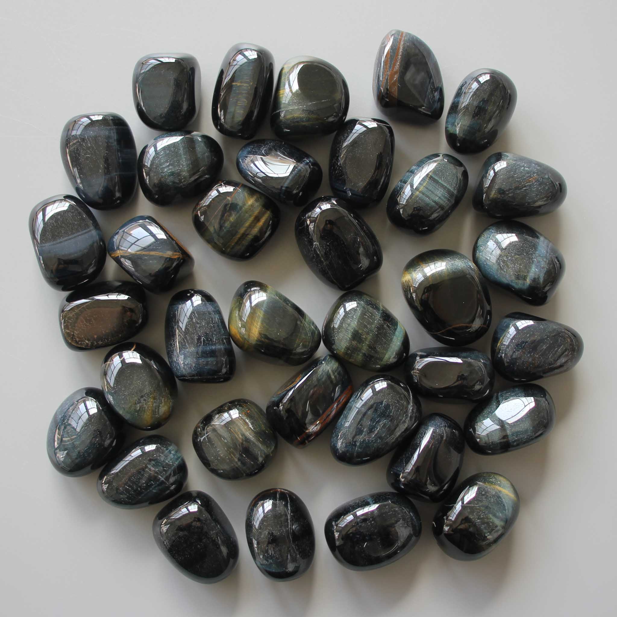 d1b68bcd7d5dab94fae2cfcf7d355247_09607094-5f85-48e6-a5ae-0ba95267ffd5 Blue Tiger Eye Tumble Stone 20/30mm A