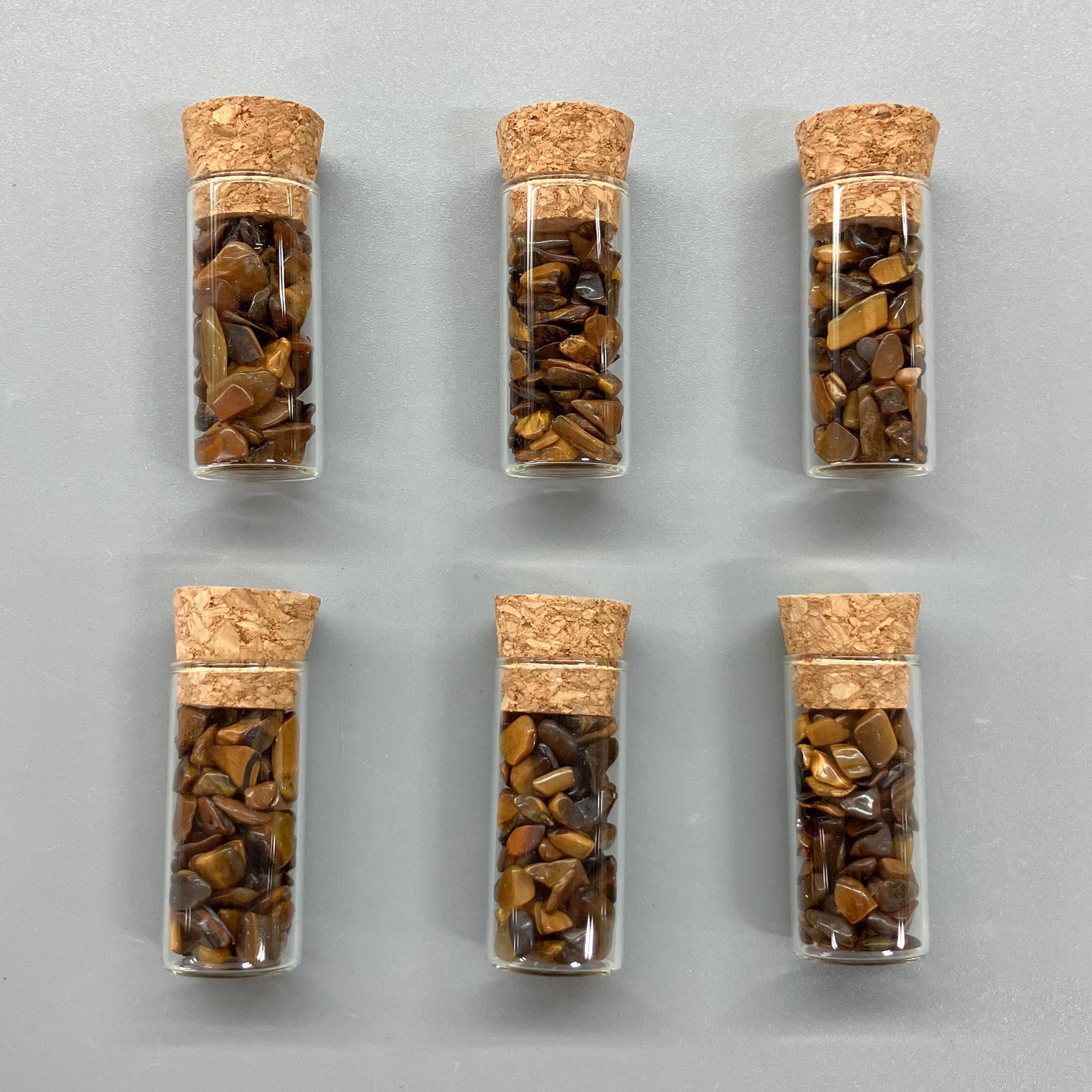 dbd9d5743b0d785ce14c3d68d7b43c36-1 Golden Tiger Eye Chips Bottle 3/8mm A/B
