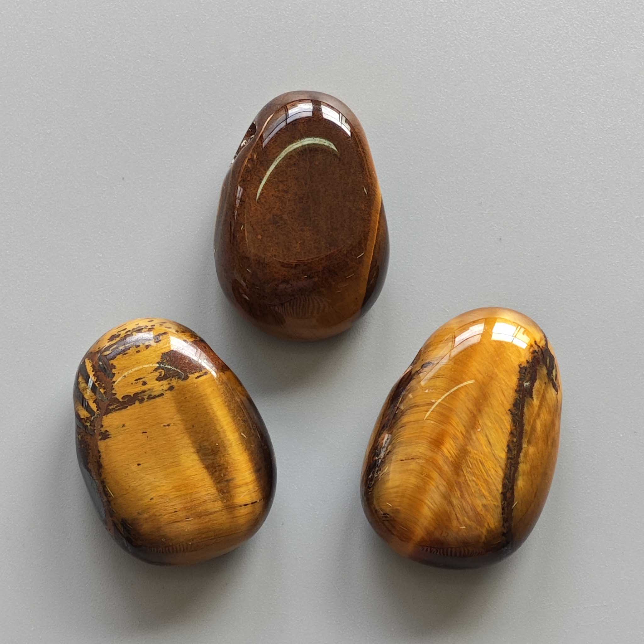 f298d731d3346963c11c9fec679917cd-1 Golden Tiger Eye Tumble Pendant With Cross Hole 2.5mm 0.8-1.2 inch (2.2-3cm) A
