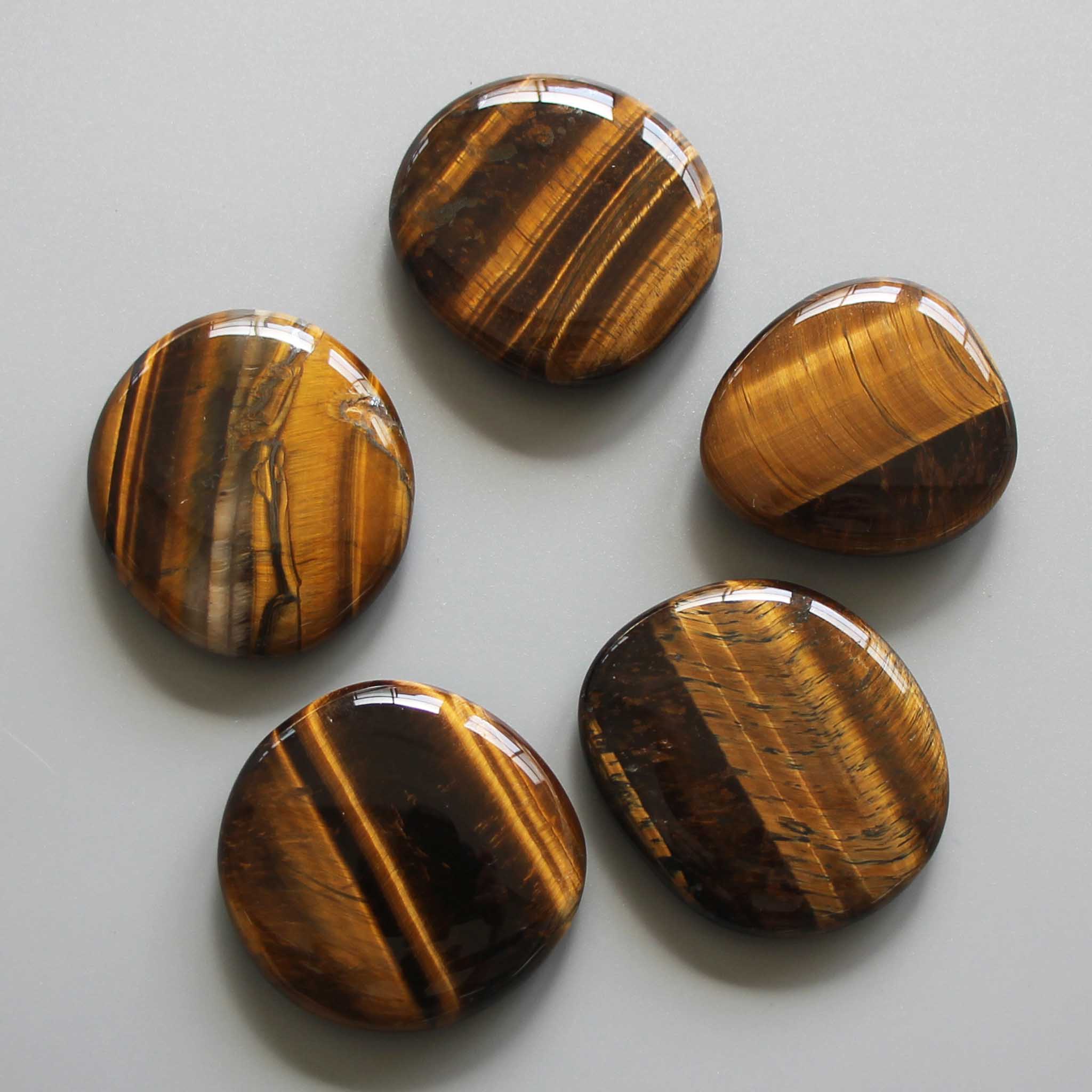 f4652606de19d863655885ab5f1f438d-1 Golden Tiger Eye Smooth Stone 1.6 inch (0.8-1 x 3.5-4.5cm) A