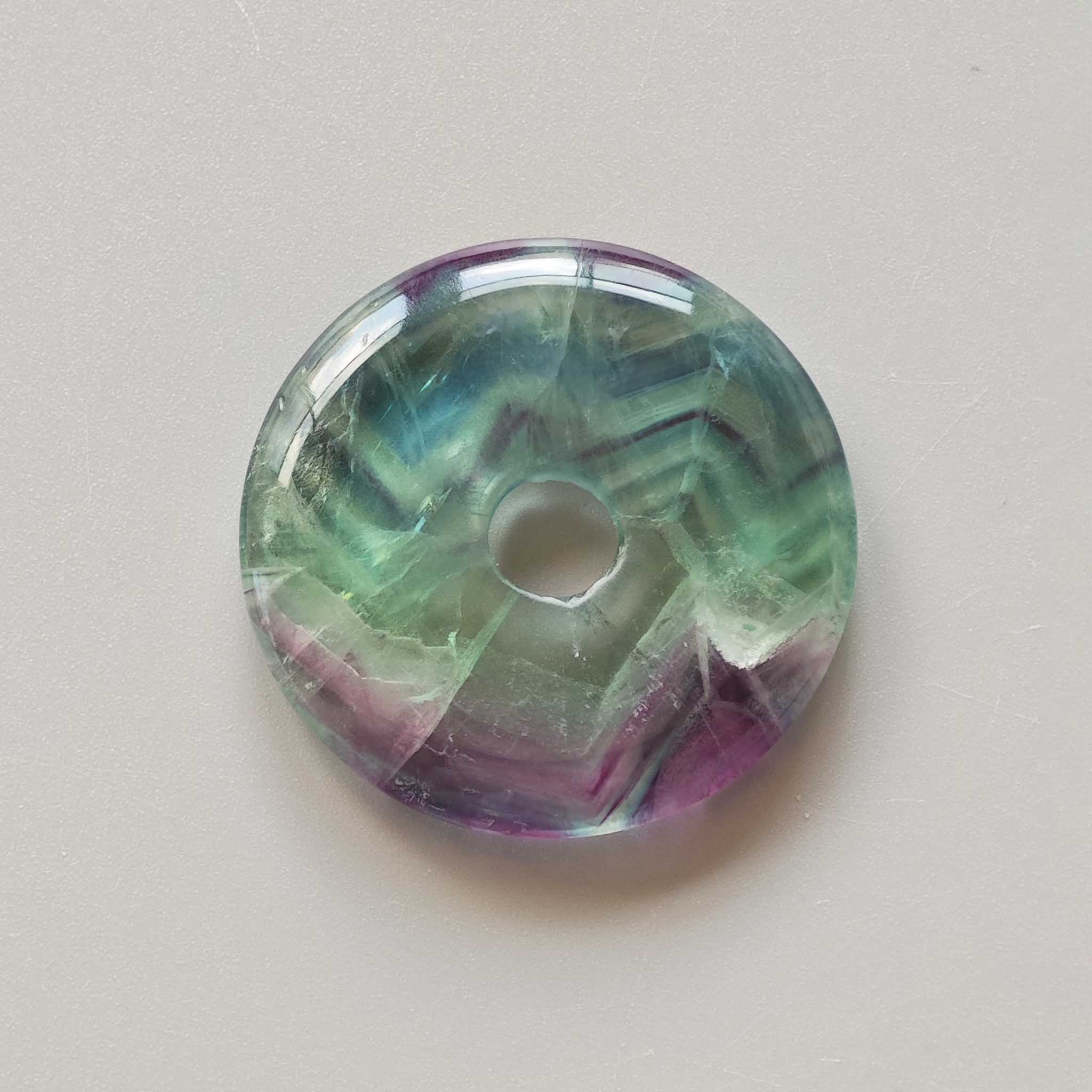 2f35de3d48b3550e133654601f194f70 Rainbow Fluorite Donut 1.6 inch (0.7 x 4cm) A/A+