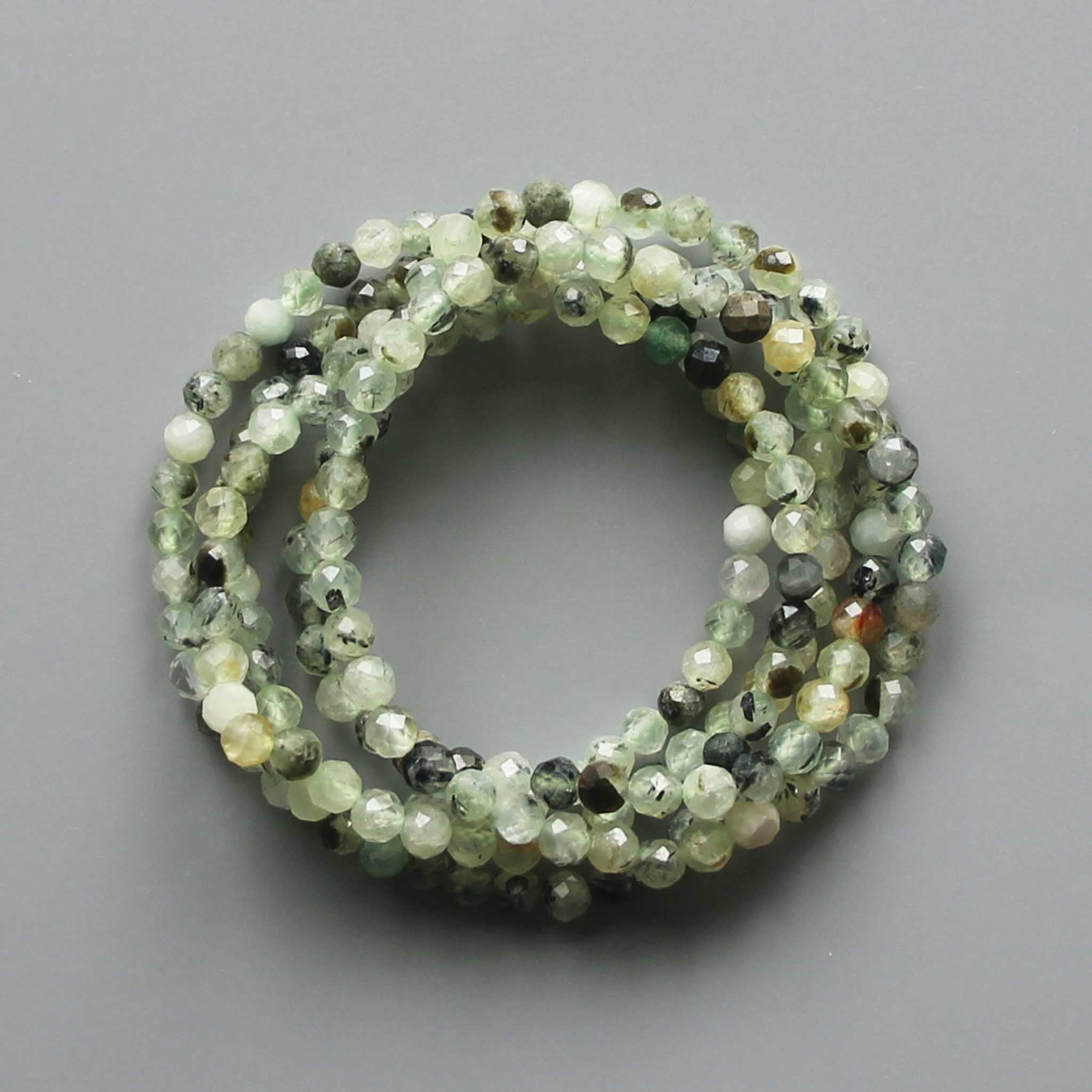 2f6ea034c4f5b93ff041dee23ee76d58-1 Epidote In Prehnite With Black Tourmaline Faceted Round Bracelet 4mm A/A+
