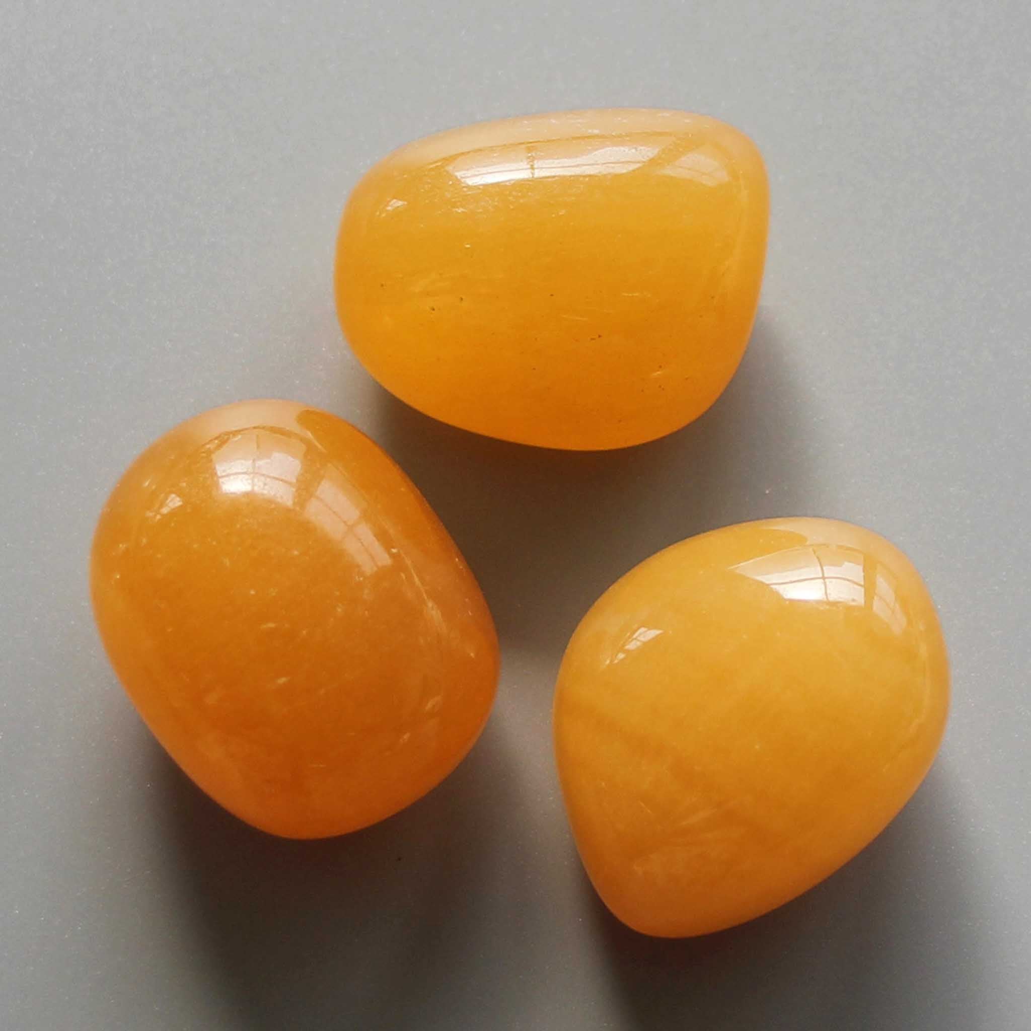 3f5127d89ea94fe69be5b777851ba74b Orange Calcite China Tumble Stone 1 inch (2-3cm) AA