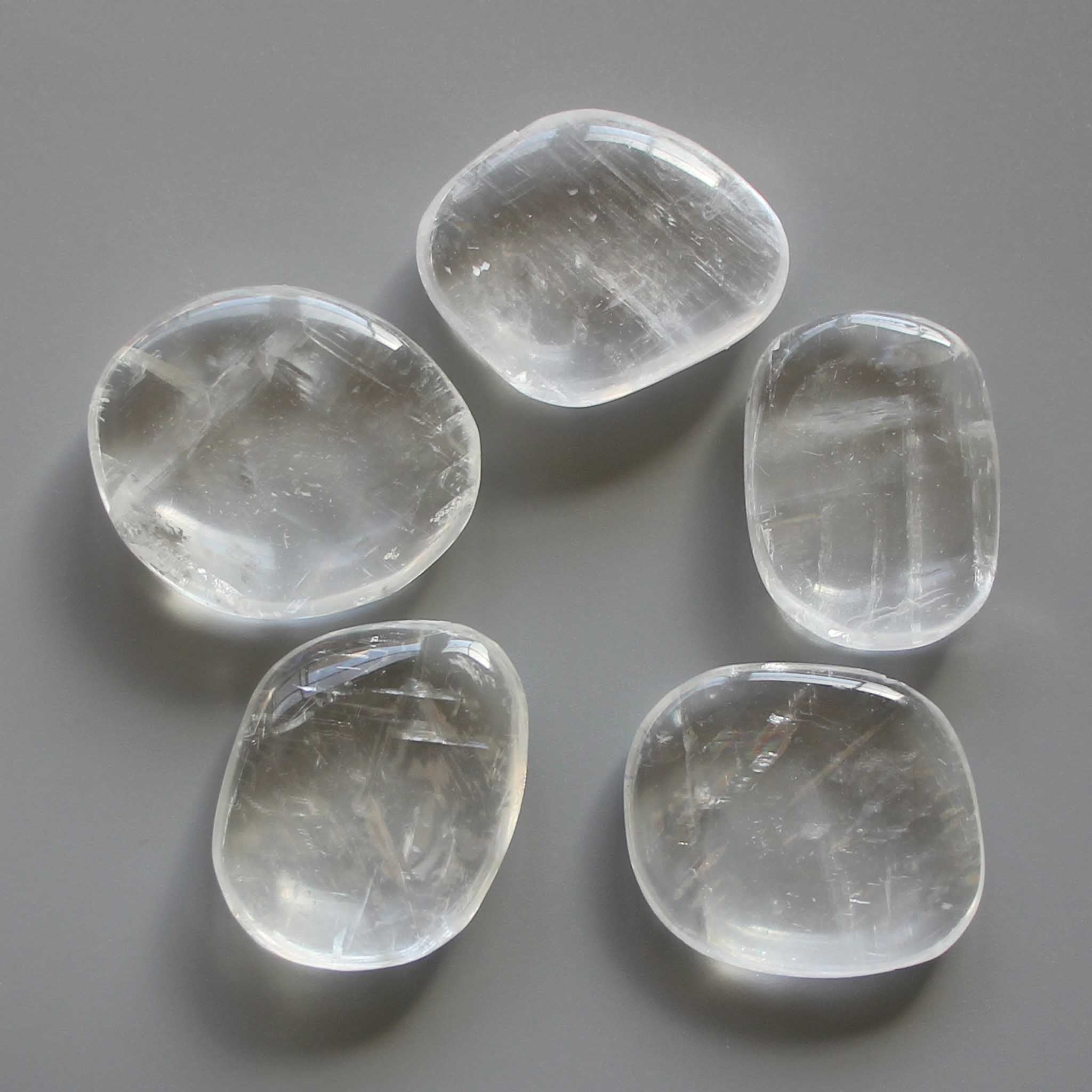 52e56fb132389403c483ce9b6b41123d White Calcite Smooth Stone 1.6 inch (0.8-1 x 3.5-4.5cm) A/A+