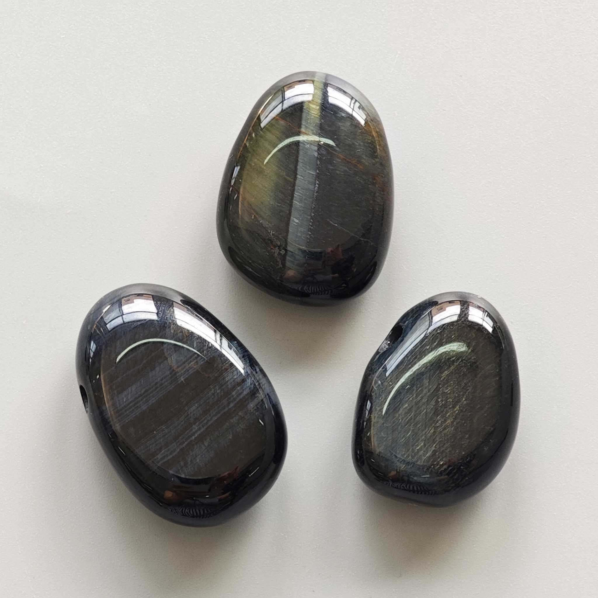 63b36ae4702911b944f8c33205b4bb8a-1 Blue Tiger Eye Tumble Pendant With Cross Hole 2.5mm 0.8-1.2 inch (2.2-3cm) A