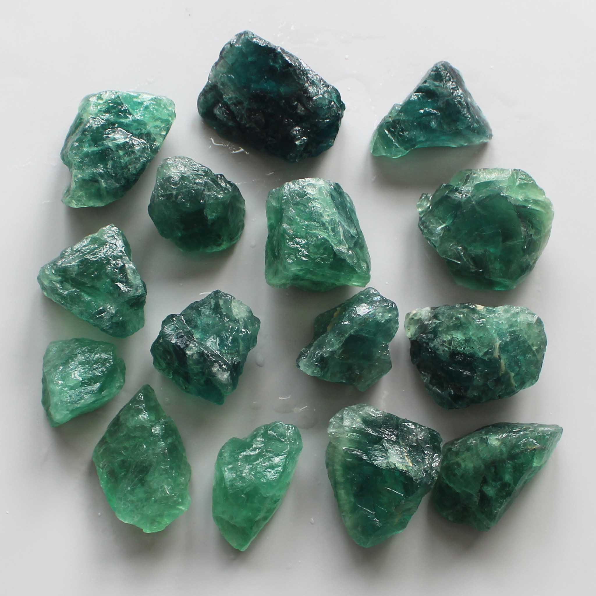 791513d4a11b38639c79ab6cbad8bab4 Aqua Green Fluorite Rough 30/50mm A+/AA