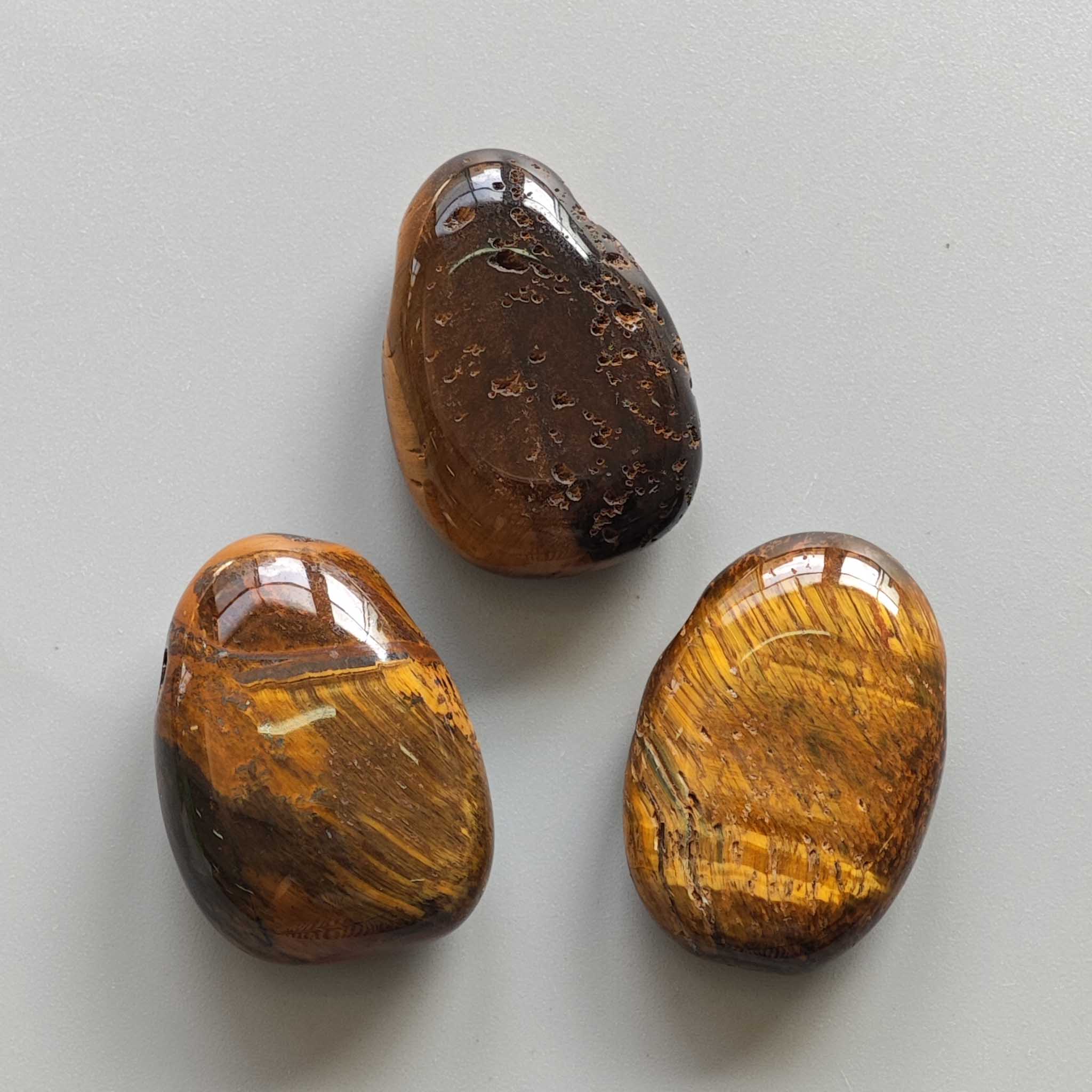 80d509f450385a58afe8660258348704-1 Golden Tiger Eye Tumble Pendant With Cross Hole 2.5mm 0.8-1.2 inch (2.2-3cm) A/B