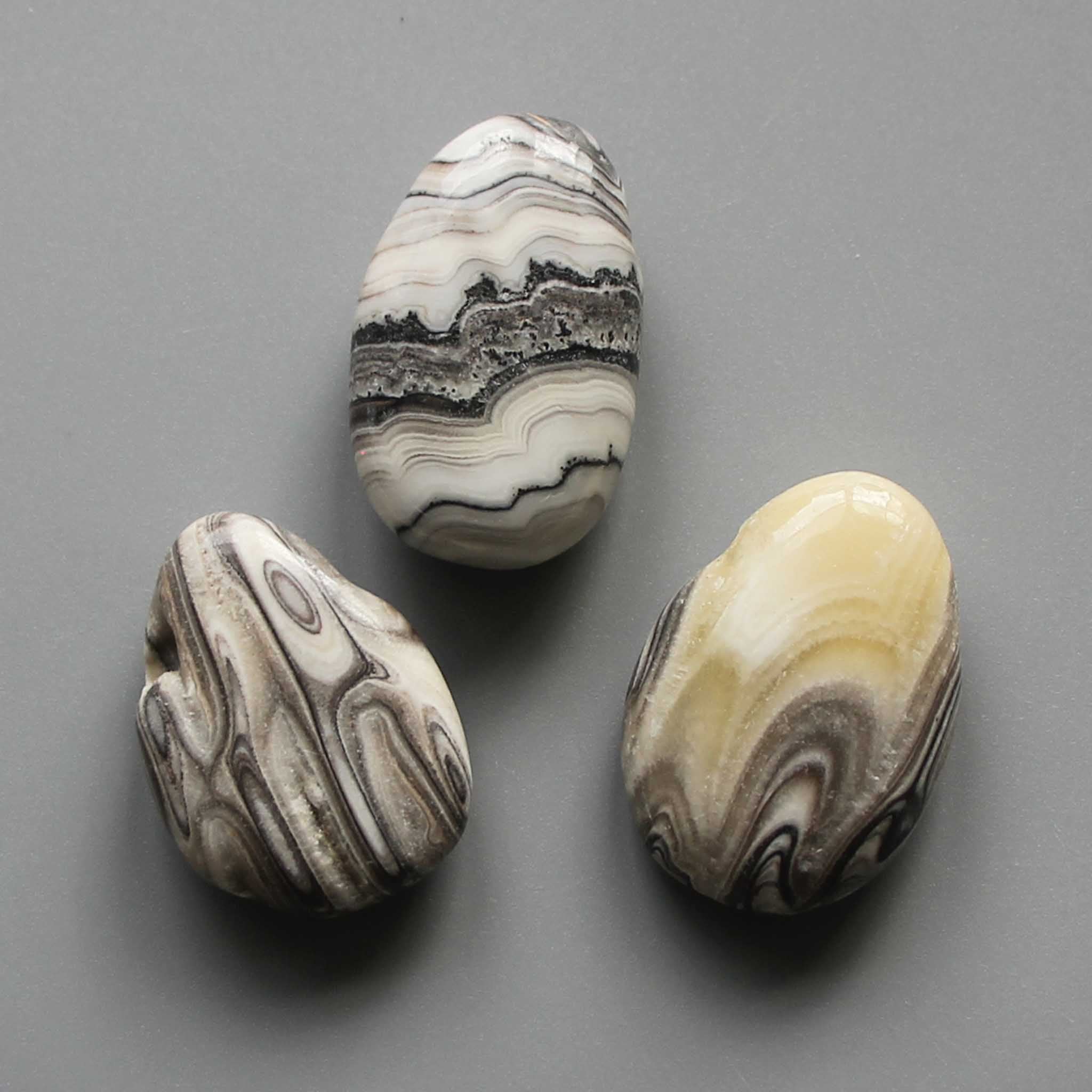 8dc74fe57d9f8672a2853bcc988bfeee-1 Banded Zebra Jasper Tumble Pendant With Cross Hole 2.5mm 0.8-1.2 inch (2.2-3cm) A