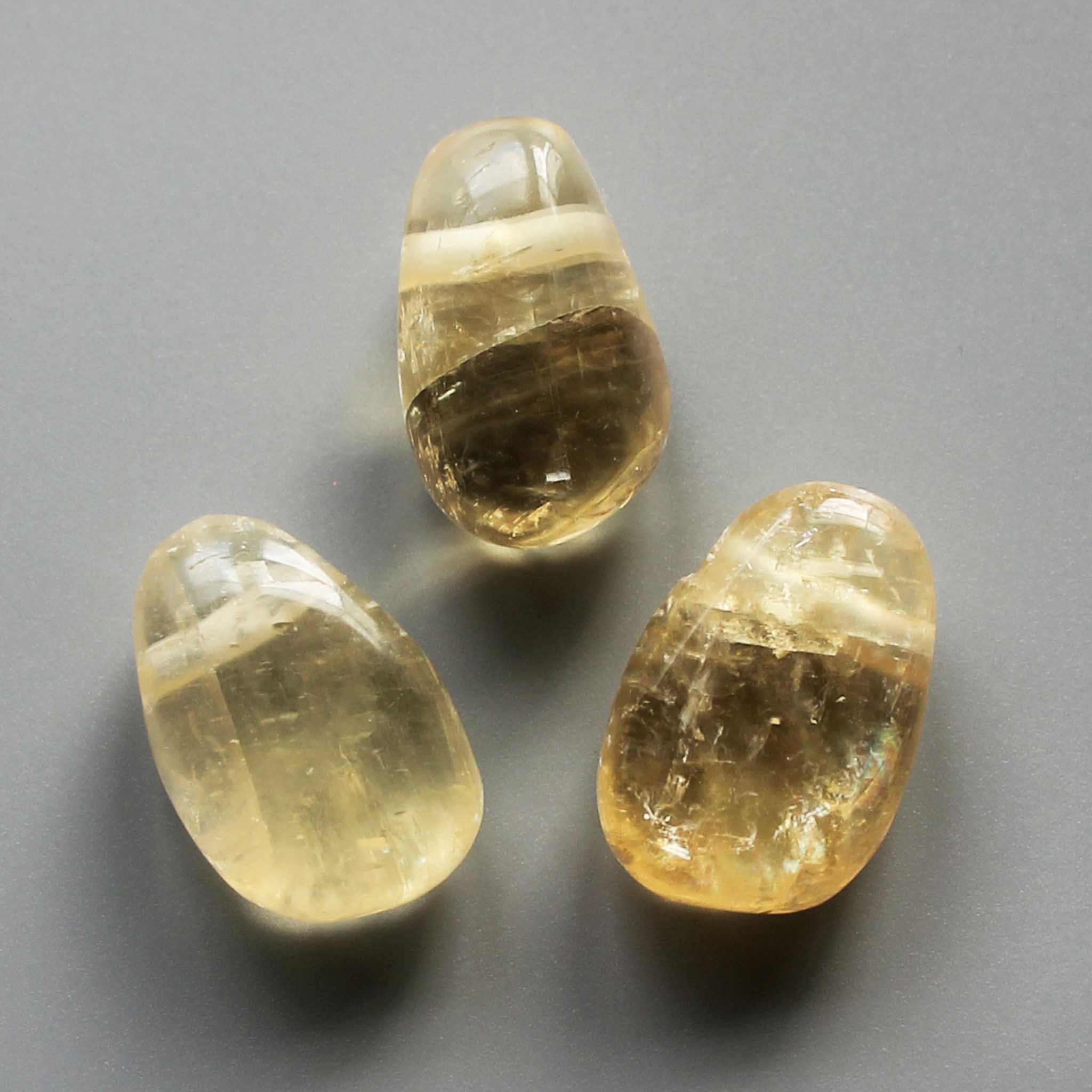 c48231473ad8d85faaa8ed620650544d-1 Yellow Calcite Tumble Pendant With Cross Hole 2.5mm 0.8-1.2 inch (2.2-3cm) A