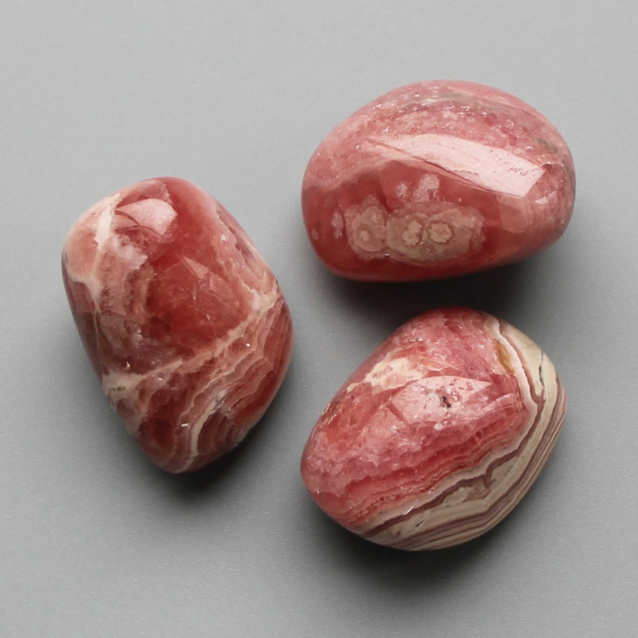 e477289a2ac65136fc407e4b134fc8a5 Rhodochrosite Argentina Tumble Stone 1 inch (2-3cm) AA