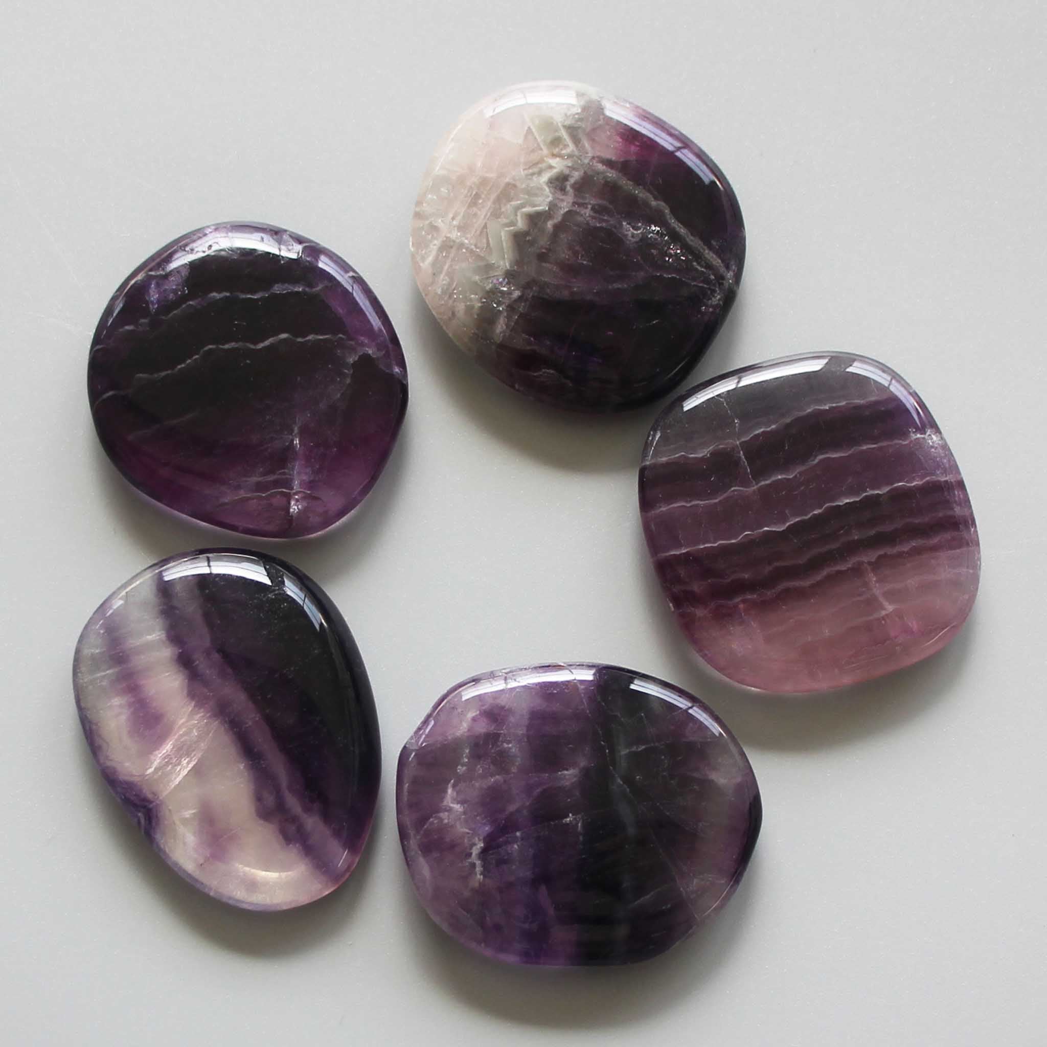 e6f5a2e713d13f7f041fd7009ee5d8ff Purple Rainbow Fluorite Smooth Stone 1.6 inch (0.8-1 x 3.5-4.5cm) A/A+