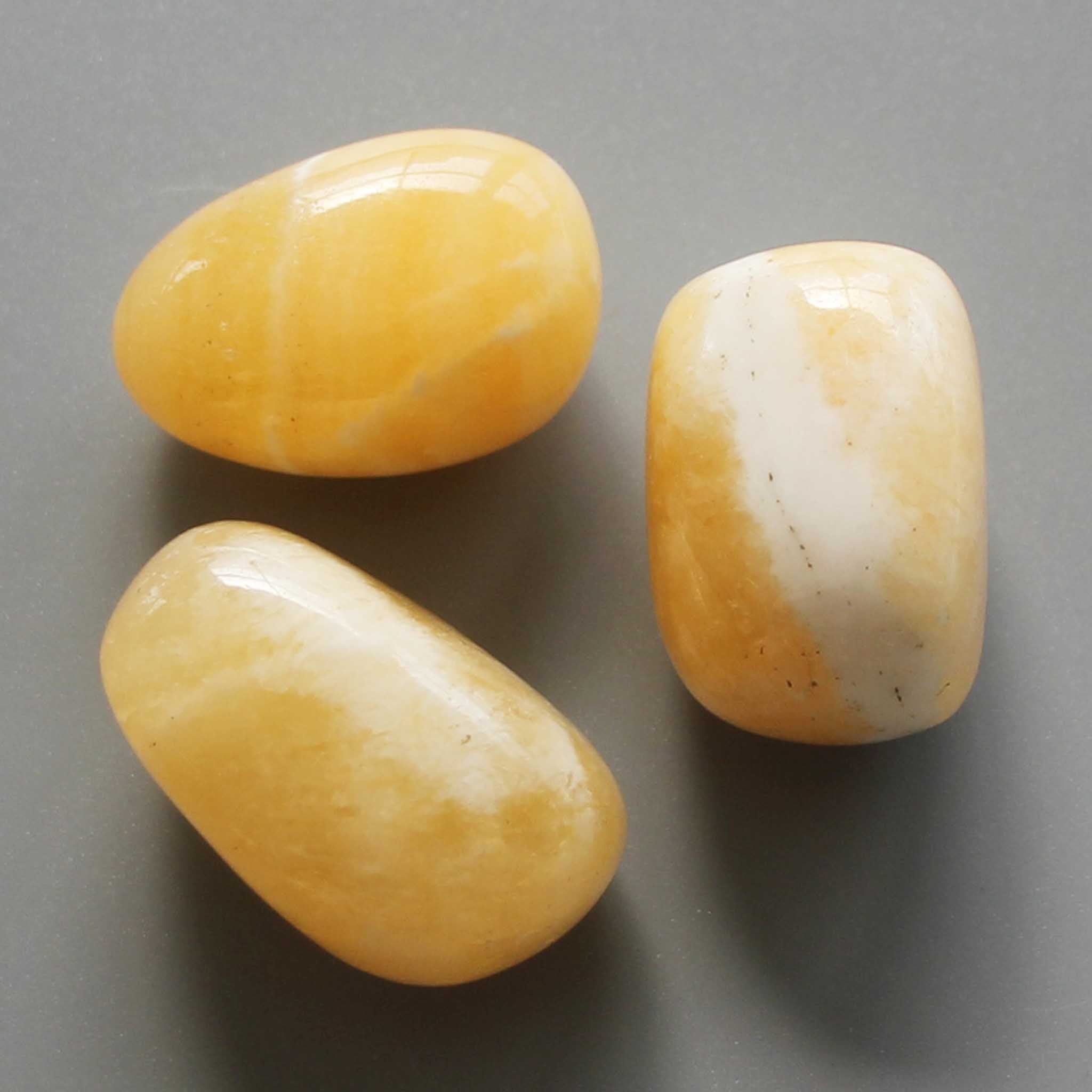 ee5d4de444920bd5544132ada6357a14 Orange Calcite China Tumble Stone 1 inch (2-3cm) B